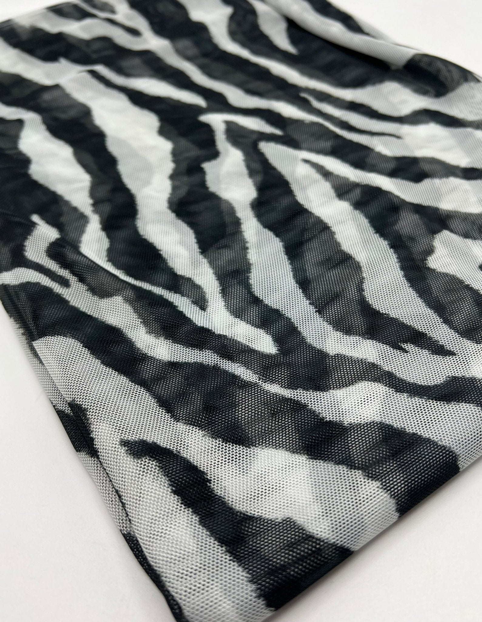 Black Zebra Print Mesh Fabric 2 Way Stretch - T9 Fabrics