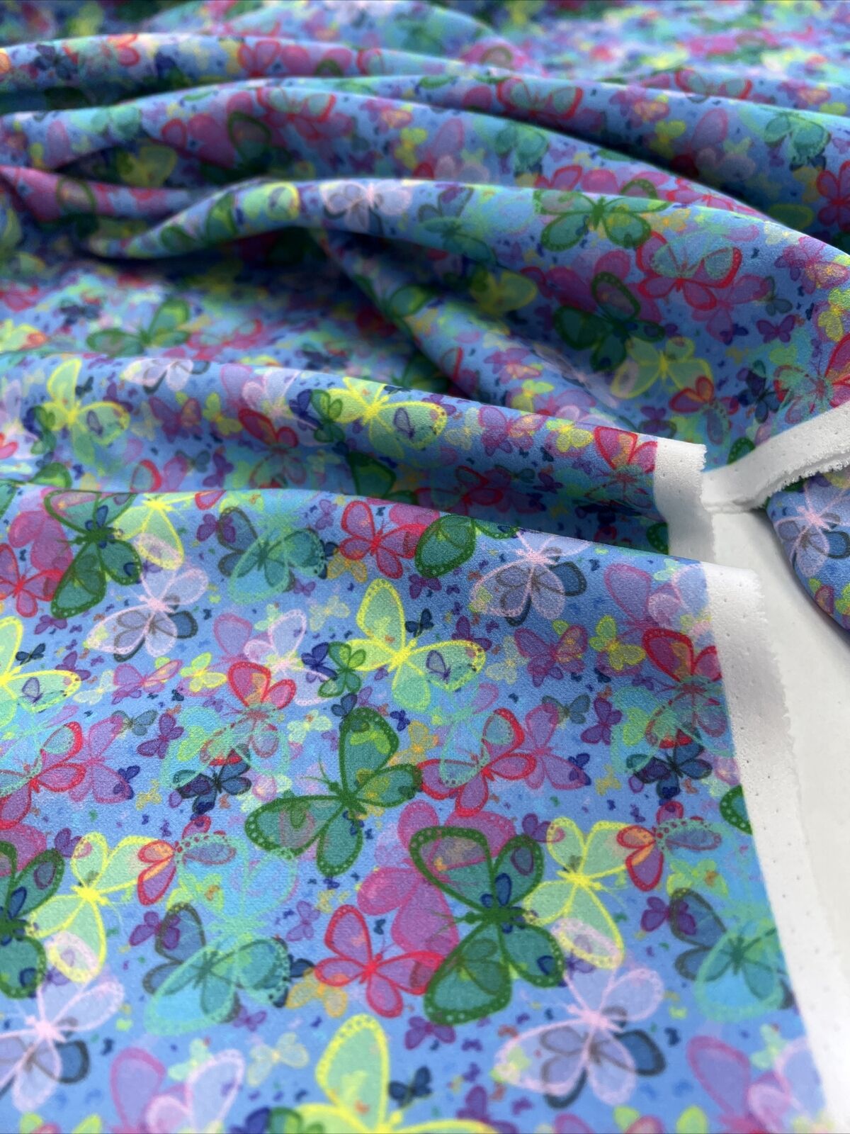 Blue Multi Butterfly Printed Scuba Crepe Jersey Fabric4 Way Stretch - T9 Fabrics