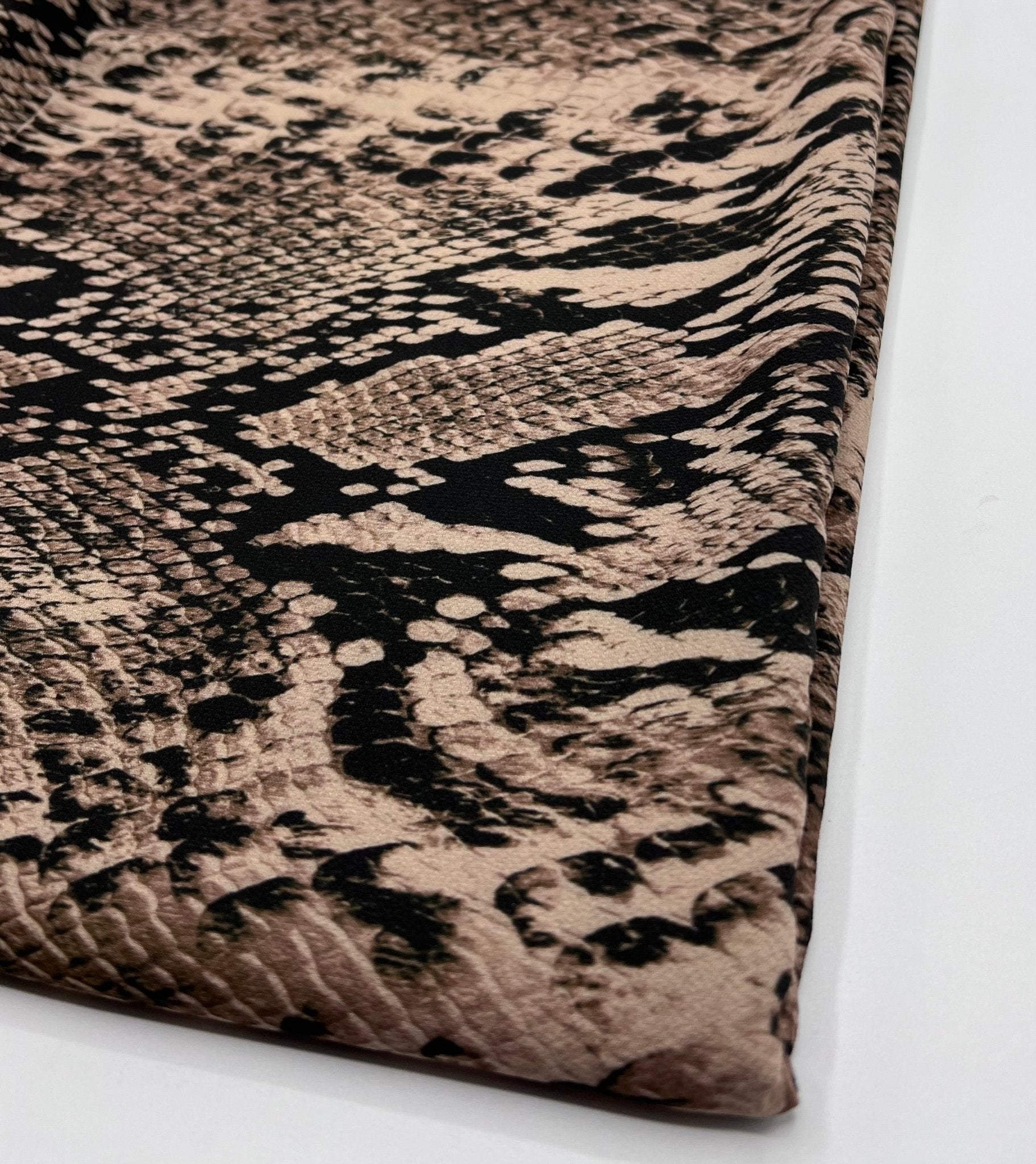 Brown Snake Print Light weight Bubble Crepe Fabric - T9 Fabrics