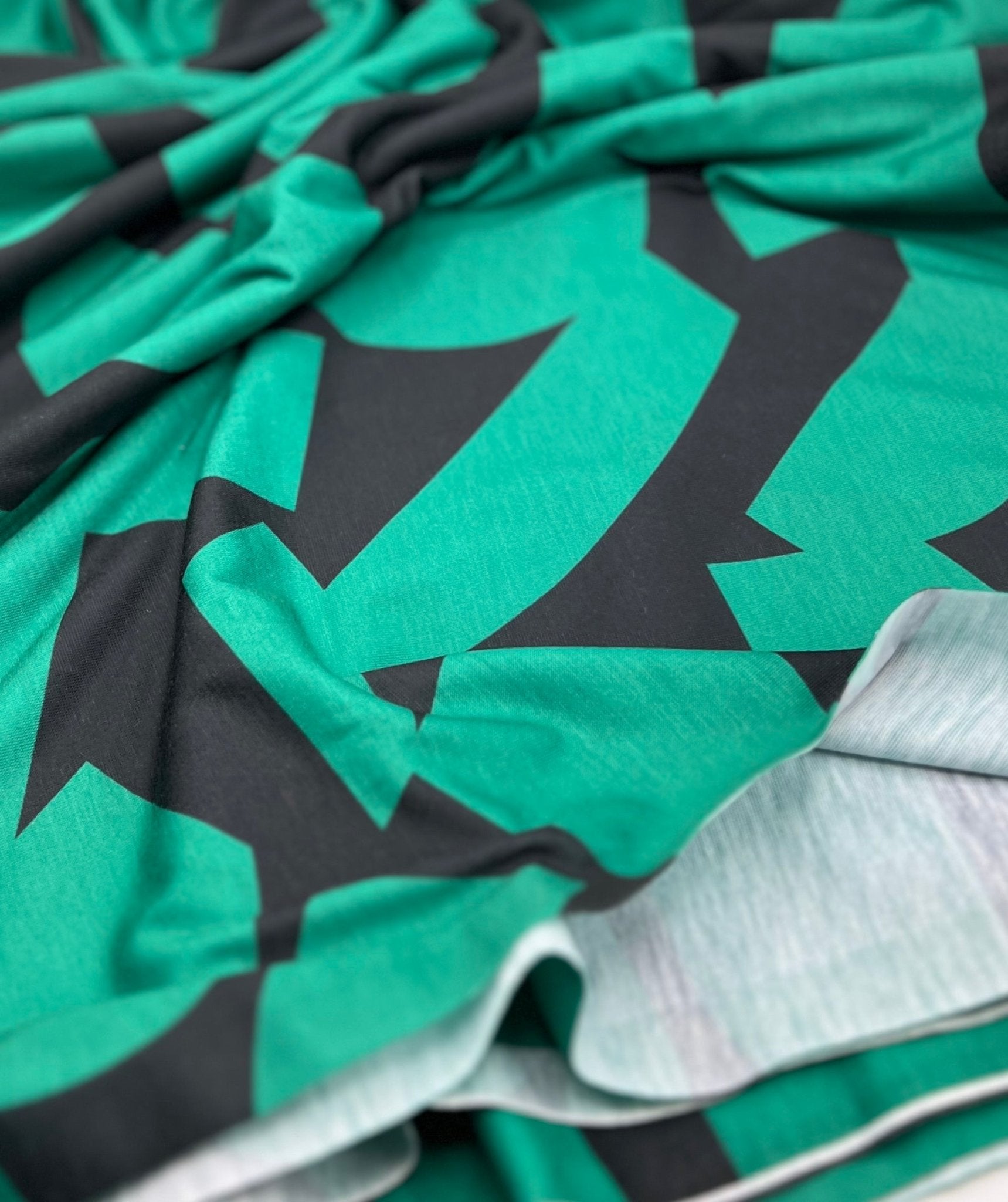 Green Black Spun Poly Stretch Fabric - T9 Fabrics