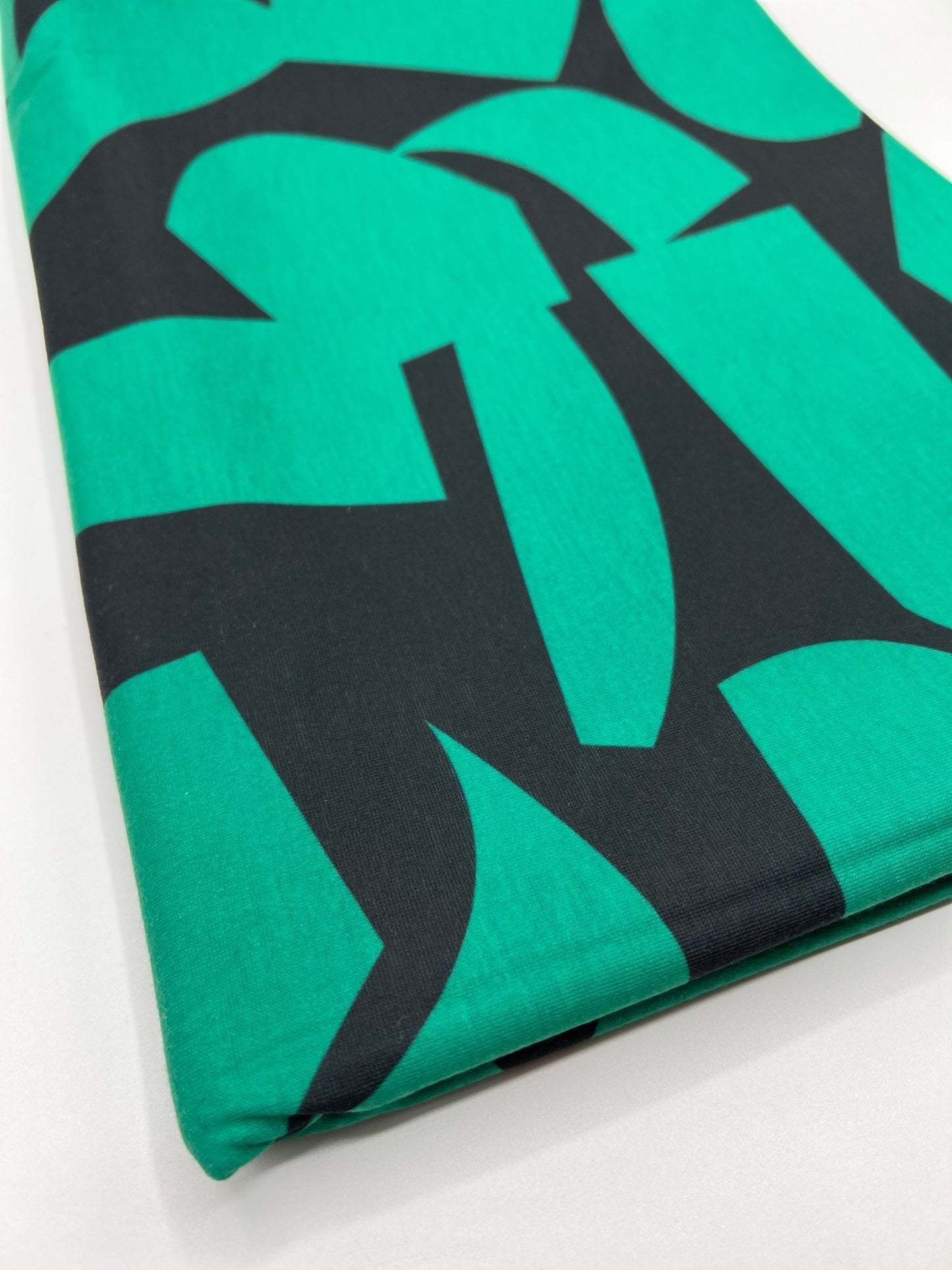 Green Black Spun Poly Stretch Fabric - T9 Fabrics