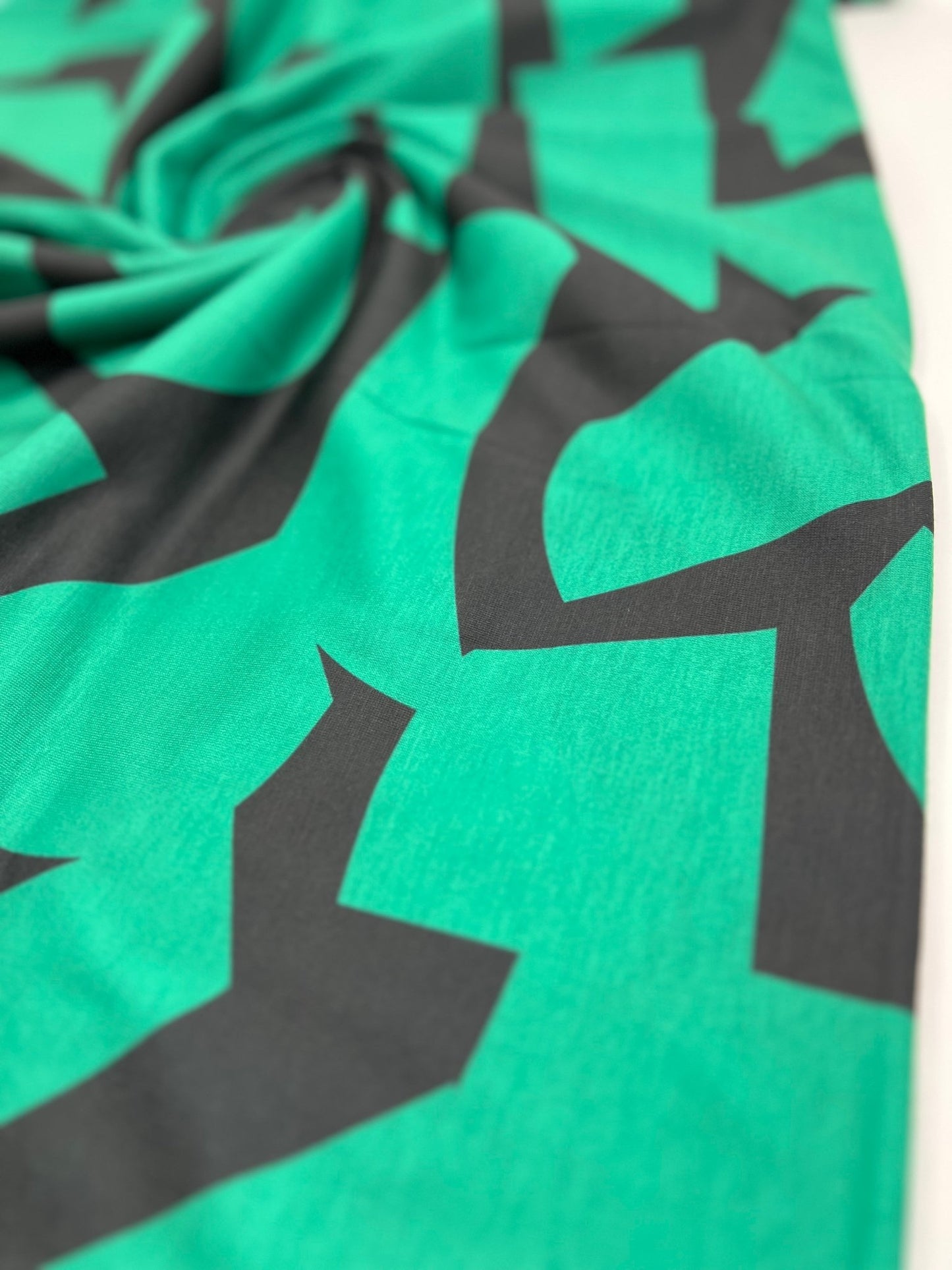 Green Black Spun Poly Stretch Fabric - T9 Fabrics