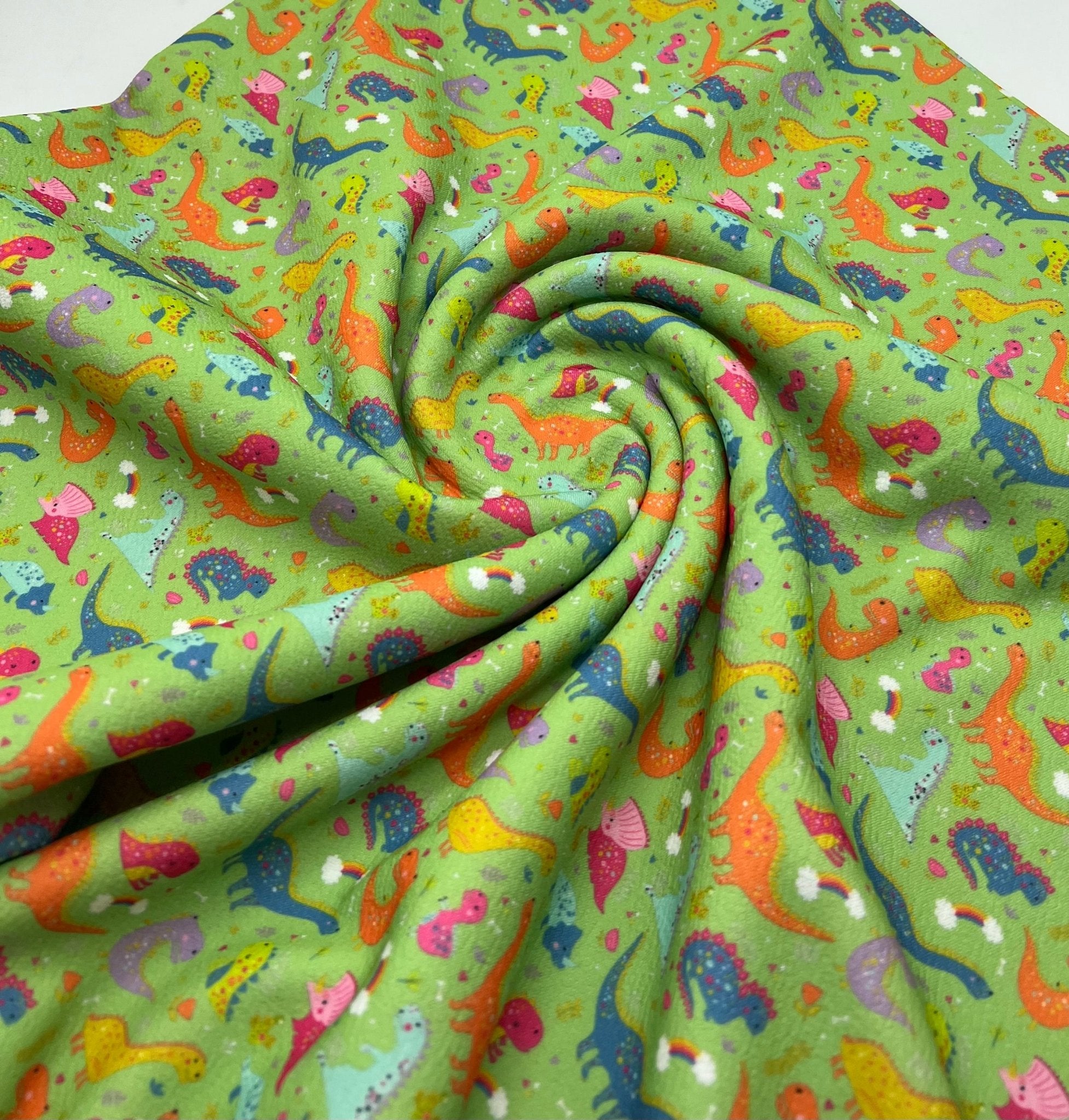 Green Dinosaur Print Liverpool Stretch Fabric - T9 Fabrics