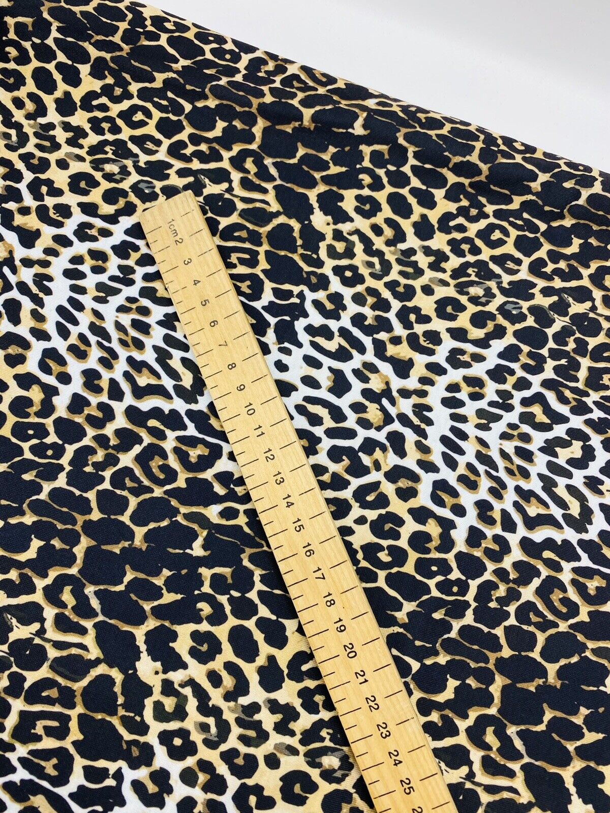 Leopard White Print Spun Poly Stretch Fabric - T9 Fabrics