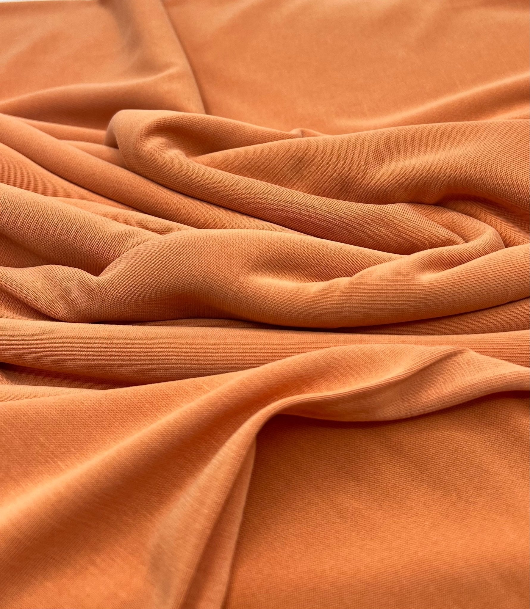 Light Orange Modal 200GSM 2 Way Stretch Fabric - T9 Fabrics