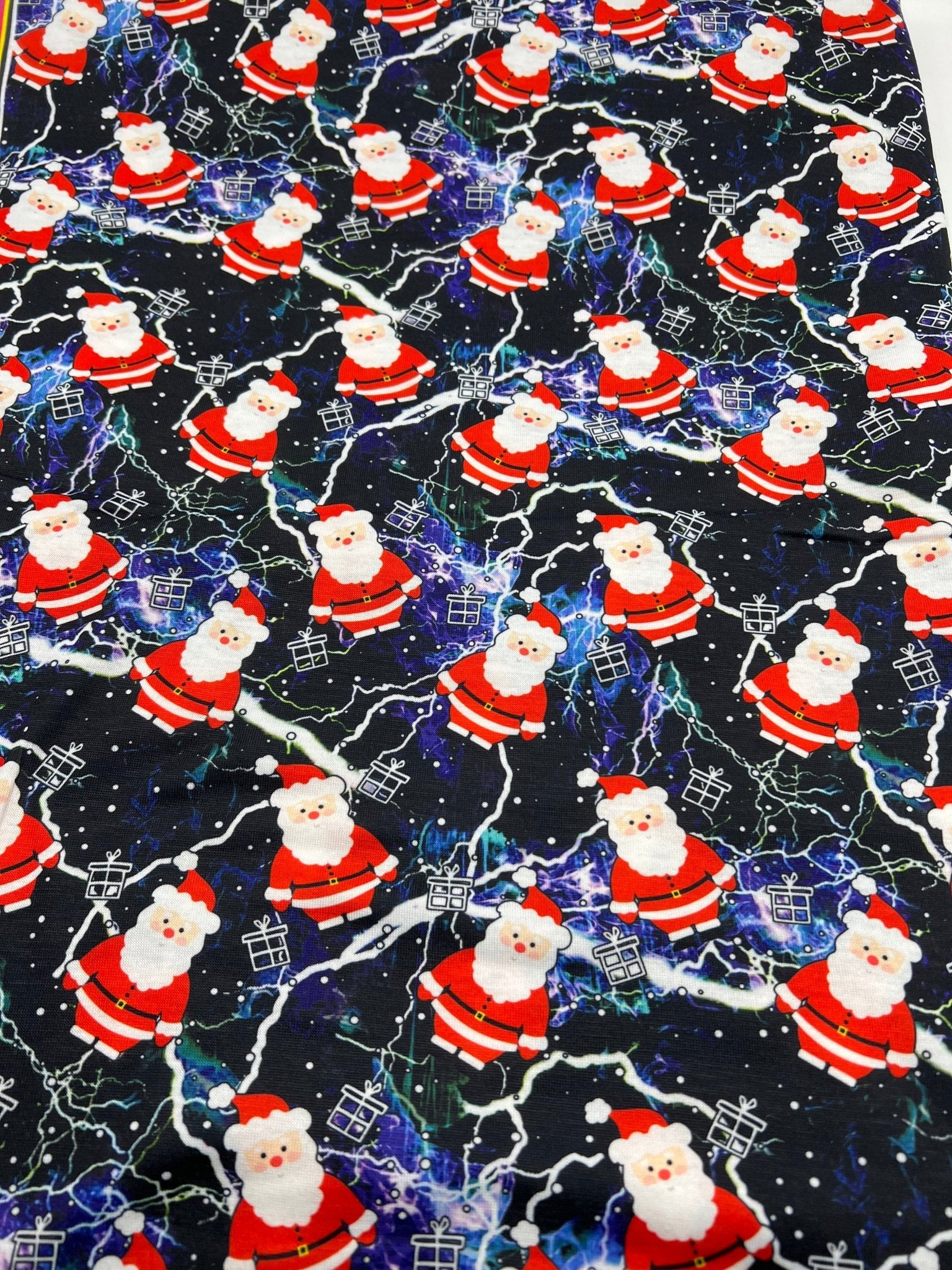 Lightning Santa Print Soft Spun Poly Stretch Fabric - T9 Fabrics