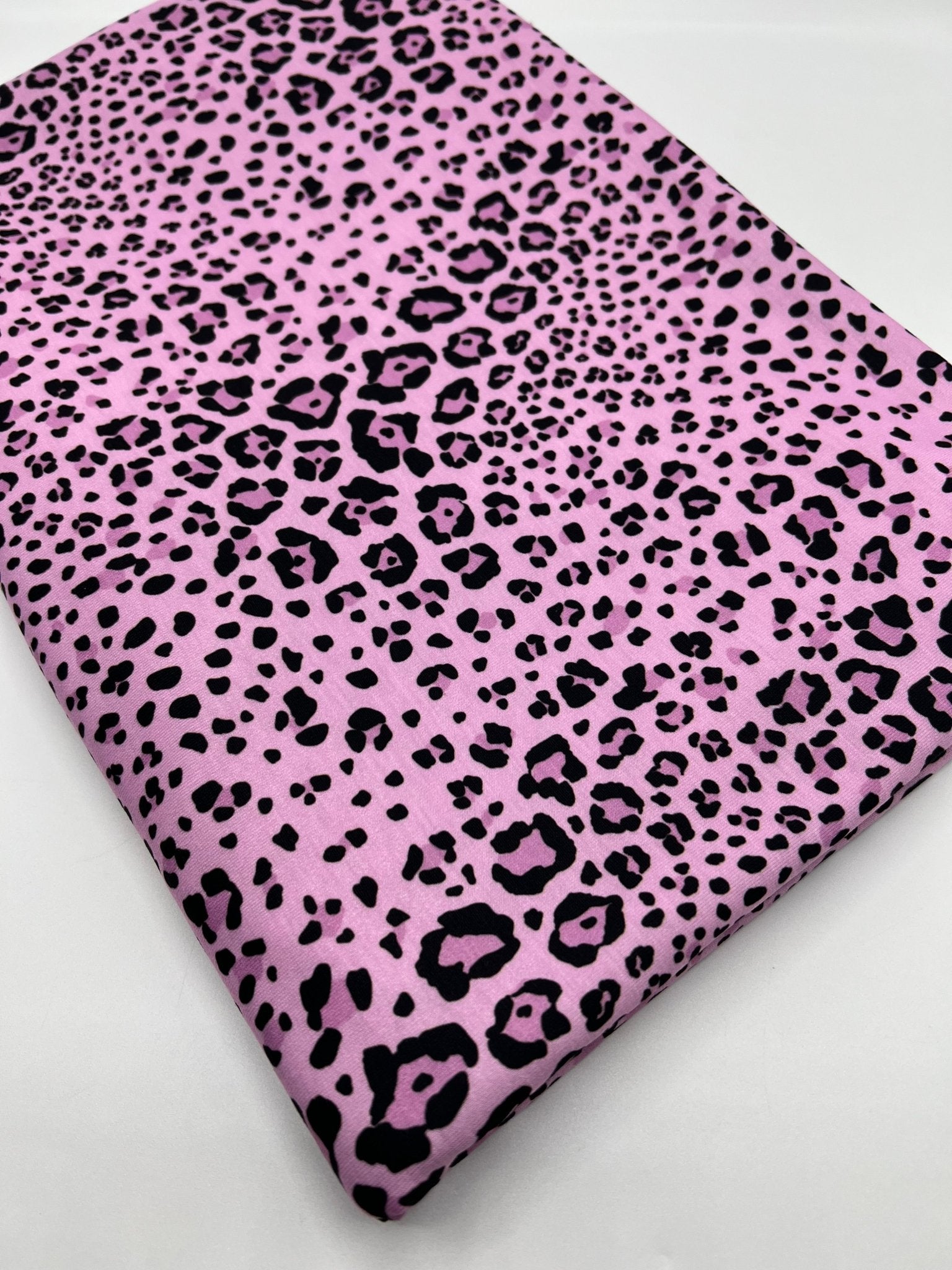 Lilac Pink Black Animal Print Viscose Elastane 4 Way Stretch Fabric - T9 Fabrics