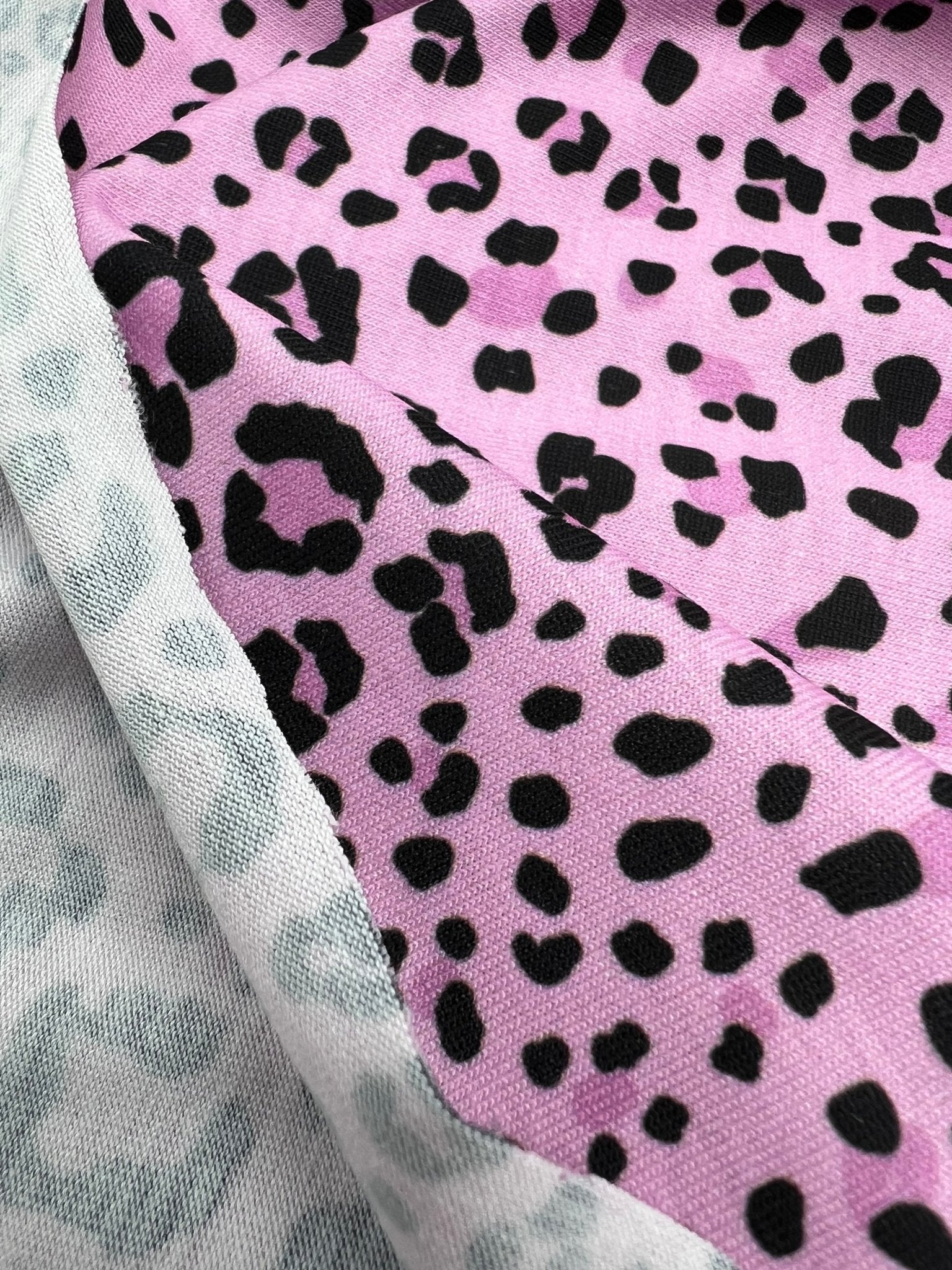 Lilac Pink Black Animal Print Viscose Elastane 4 Way Stretch Fabric - T9 Fabrics