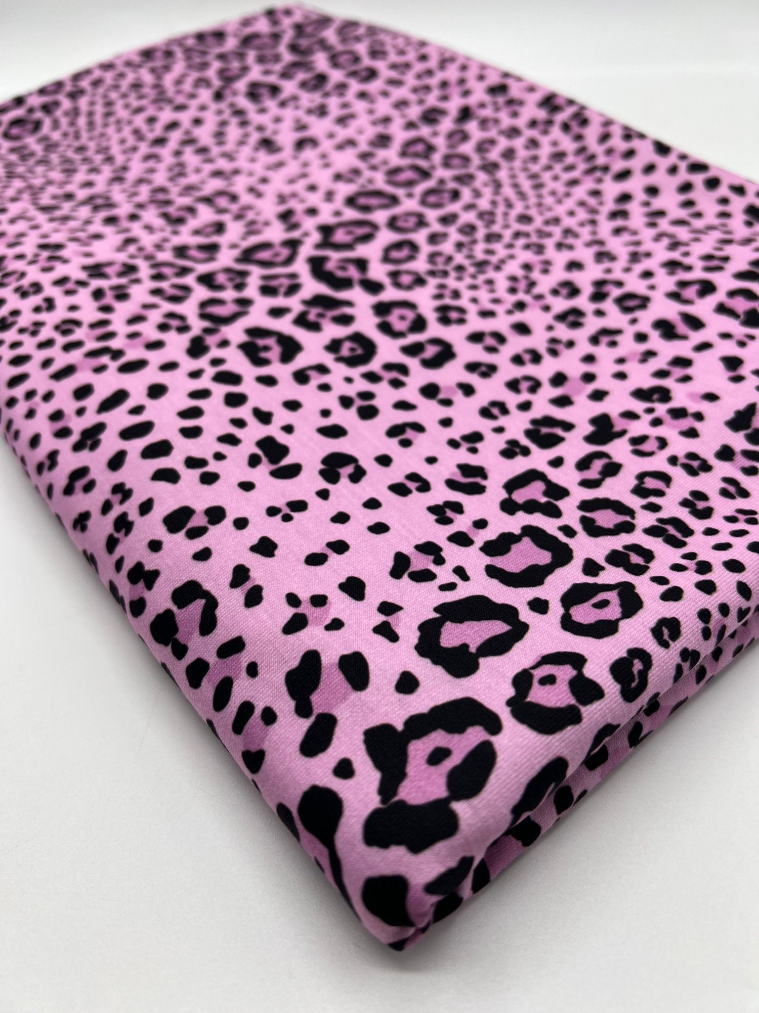 Lilac Pink Black Animal Print Viscose Elastane 4 Way Stretch Fabric - T9 Fabrics