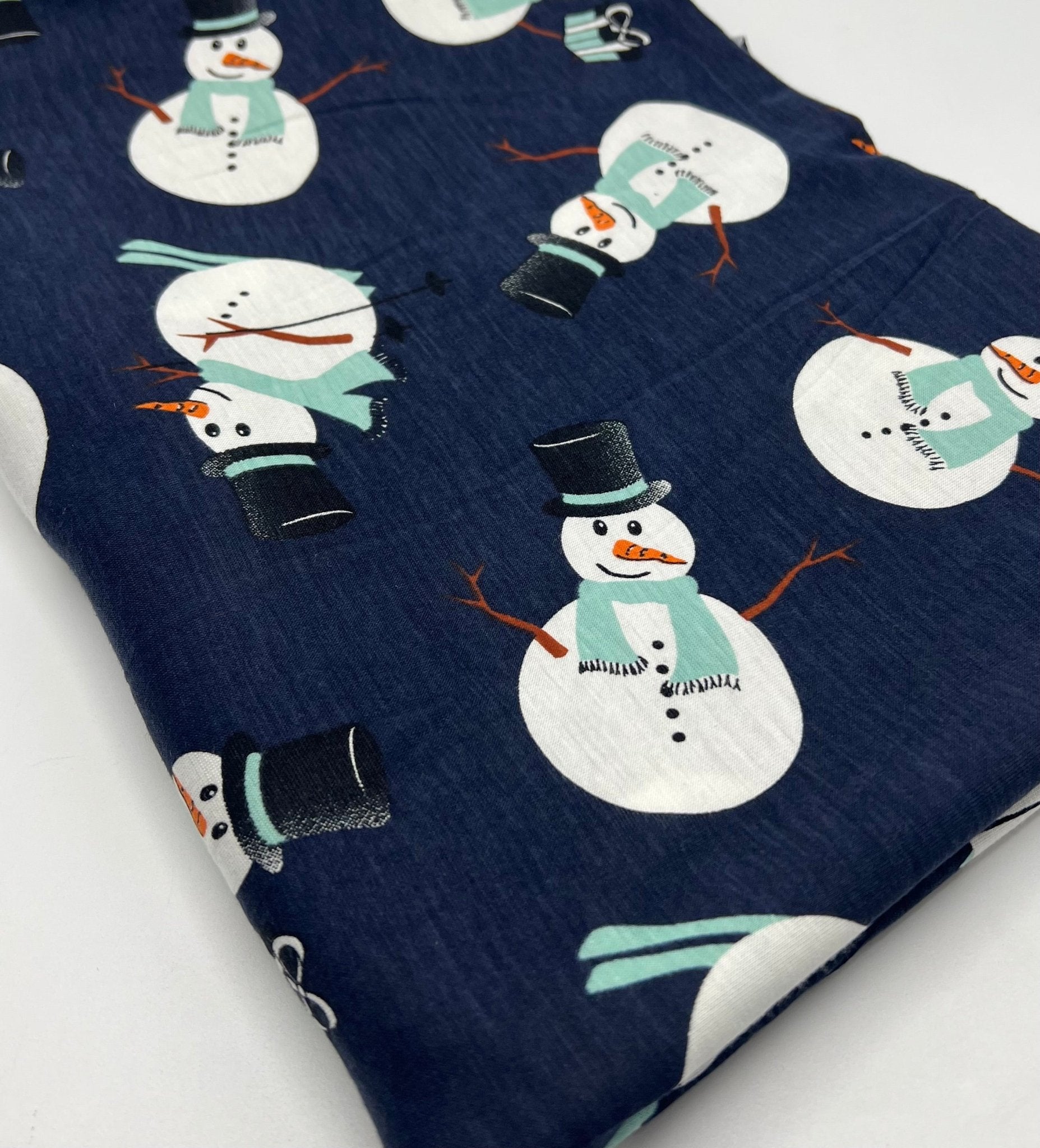 Navy Snowman Print Viscose Elastane 4 Way Stretch Fabric - T9 Fabrics