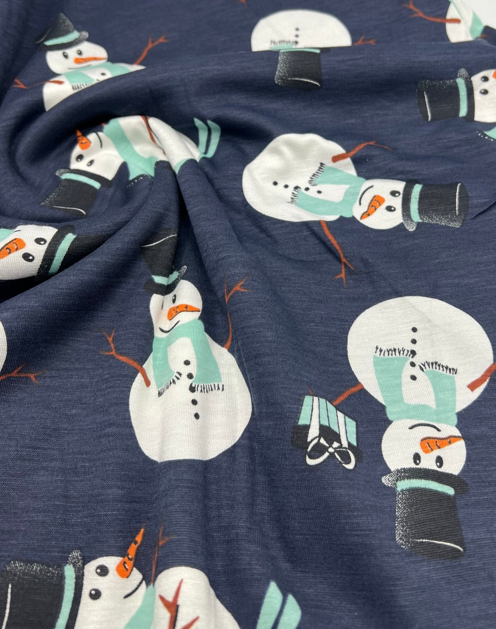 Navy Snowman Print Viscose Elastane 4 Way Stretch Fabric - T9 Fabrics