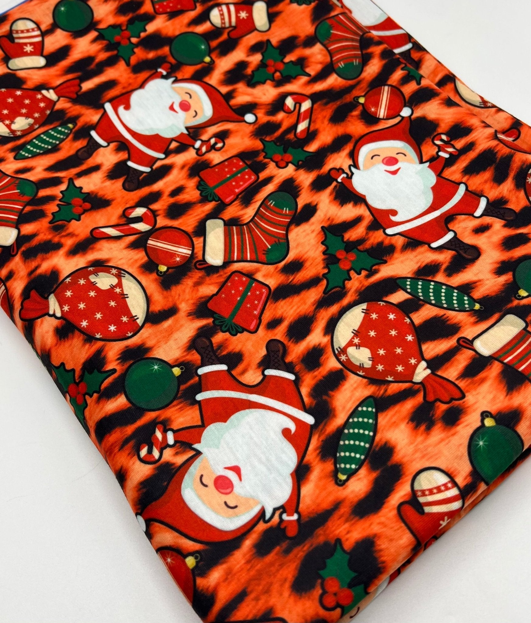 Orange Animal Santa Print Soft Spun Poly Stretch Fabric - T9 Fabrics