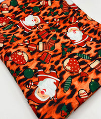 Orange Animal Santa Print Soft Spun Poly Stretch Fabric - T9 Fabrics