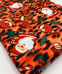Orange Animal Santa Print Soft Spun Poly Stretch Fabric - T9 Fabrics