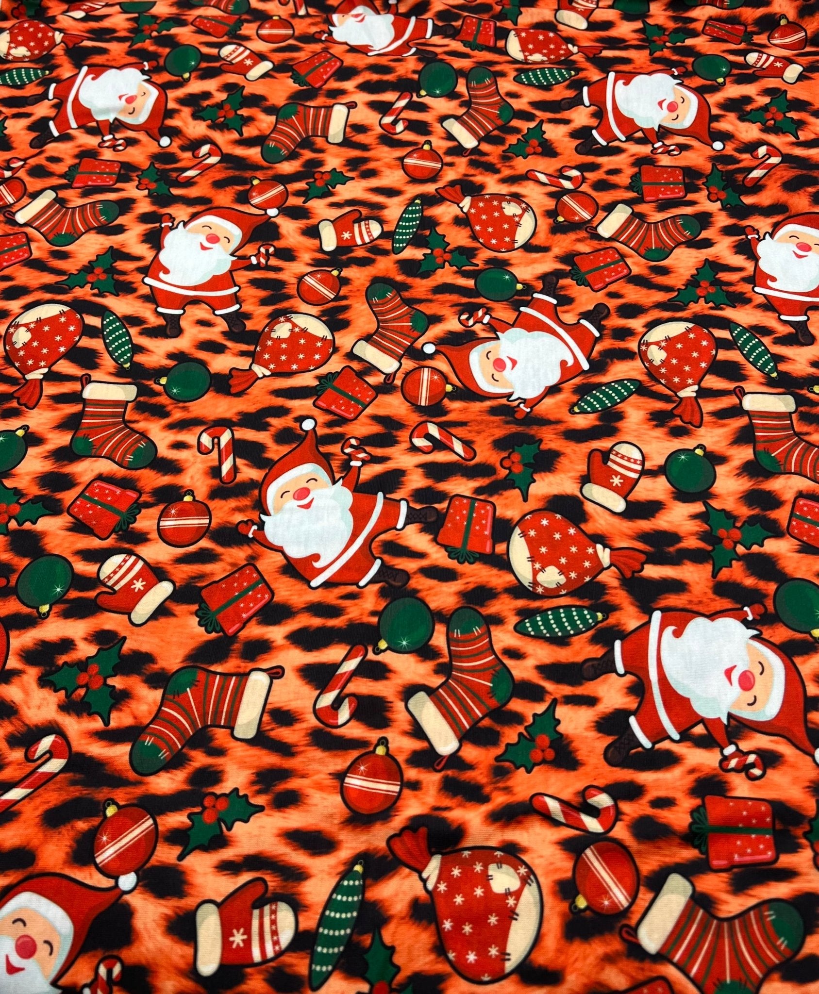 Orange Animal Santa Print Soft Spun Poly Stretch Fabric - T9 Fabrics