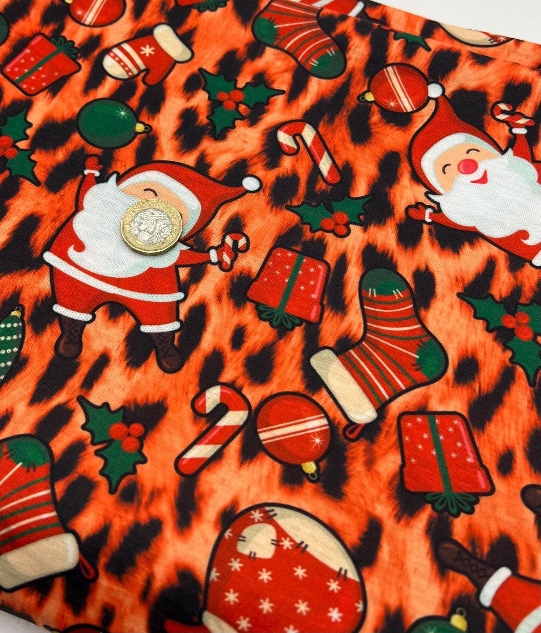Orange Animal Santa Print Soft Spun Poly Stretch Fabric - T9 Fabrics
