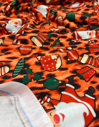 Orange Animal Santa Print Soft Spun Poly Stretch Fabric - T9 Fabrics