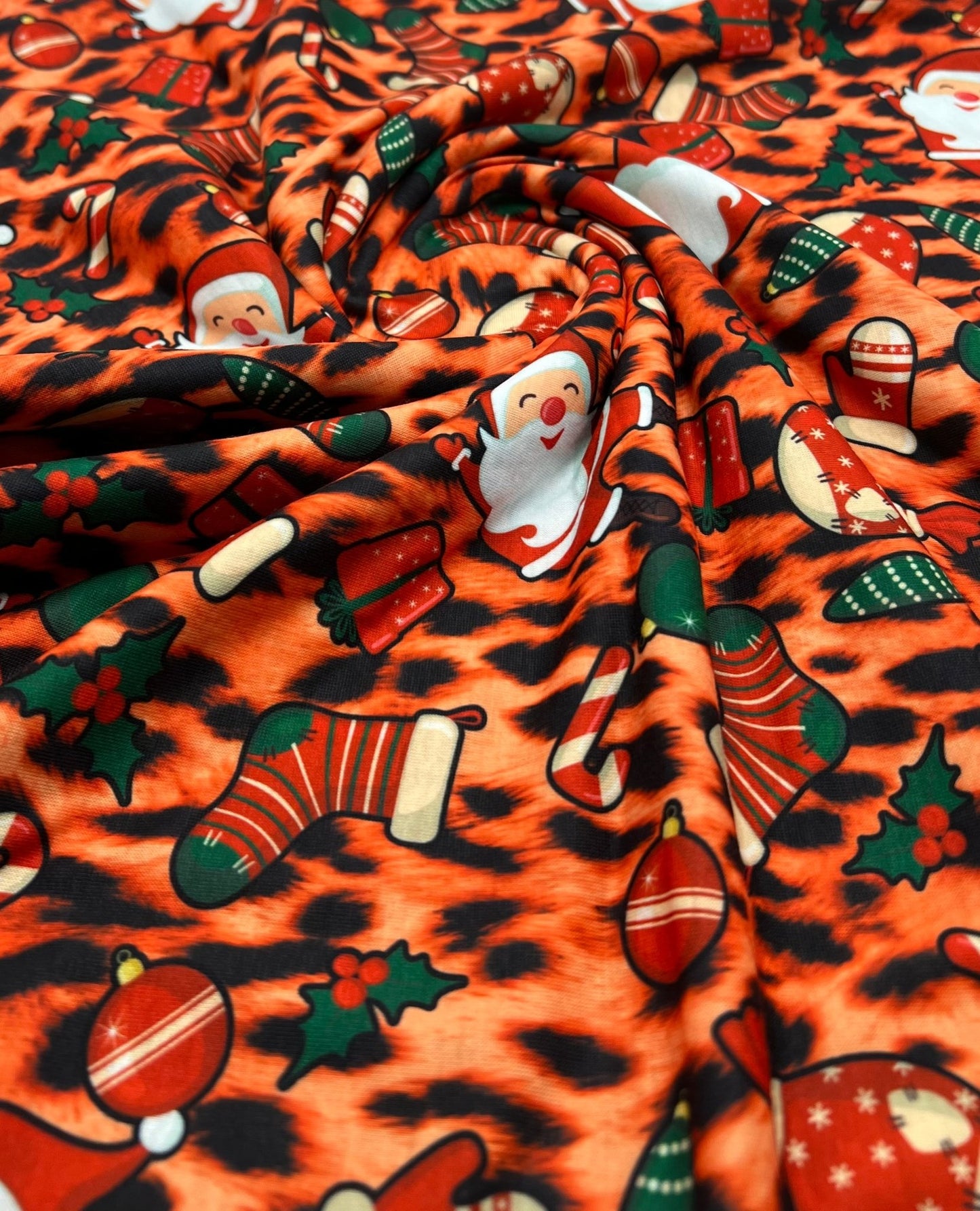 Orange Animal Santa Print Soft Spun Poly Stretch Fabric - T9 Fabrics