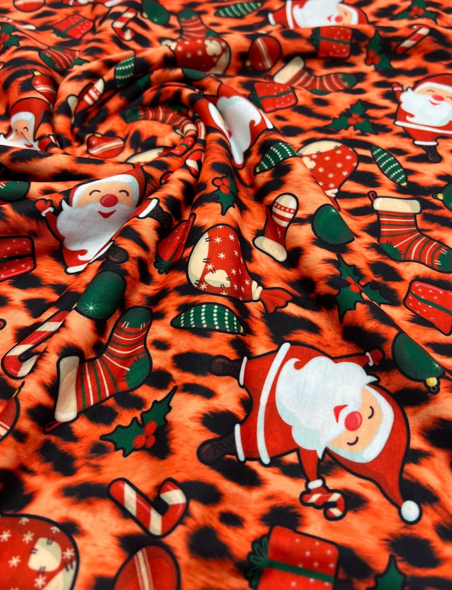 Orange Animal Santa Print Soft Spun Poly Stretch Fabric - T9 Fabrics