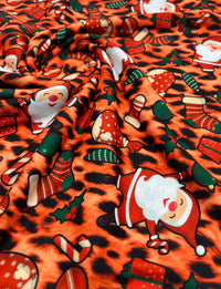 Orange Animal Santa Print Soft Spun Poly Stretch Fabric - T9 Fabrics