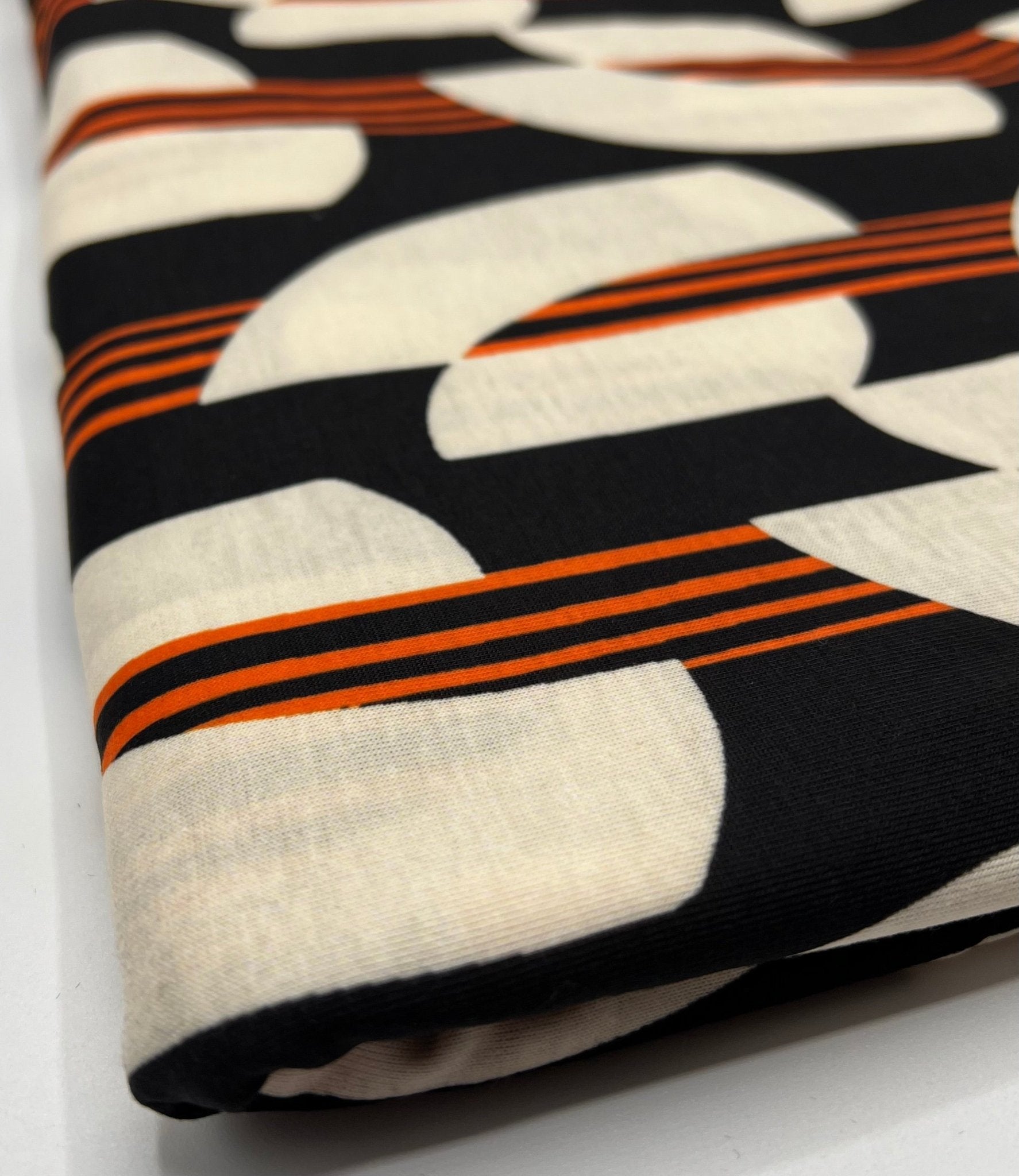 Orange Black Print Spun Poly Stretch Fabric - T9 Fabrics