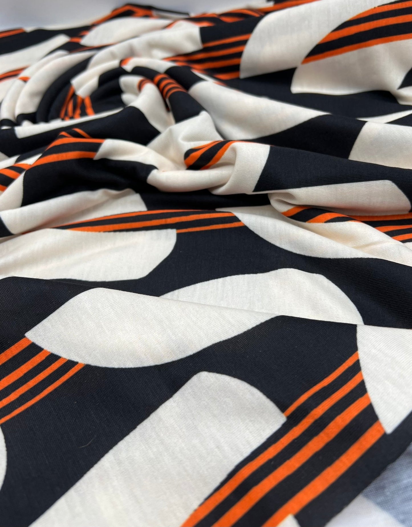 Orange Black Print Spun Poly Stretch Fabric - T9 Fabrics