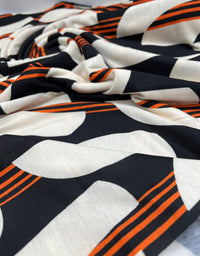 Orange Black Print Spun Poly Stretch Fabric - T9 Fabrics