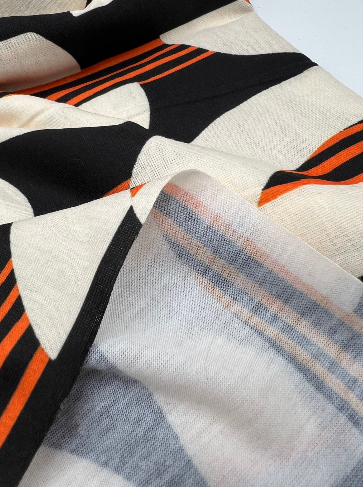 Orange Black Print Spun Poly Stretch Fabric - T9 Fabrics