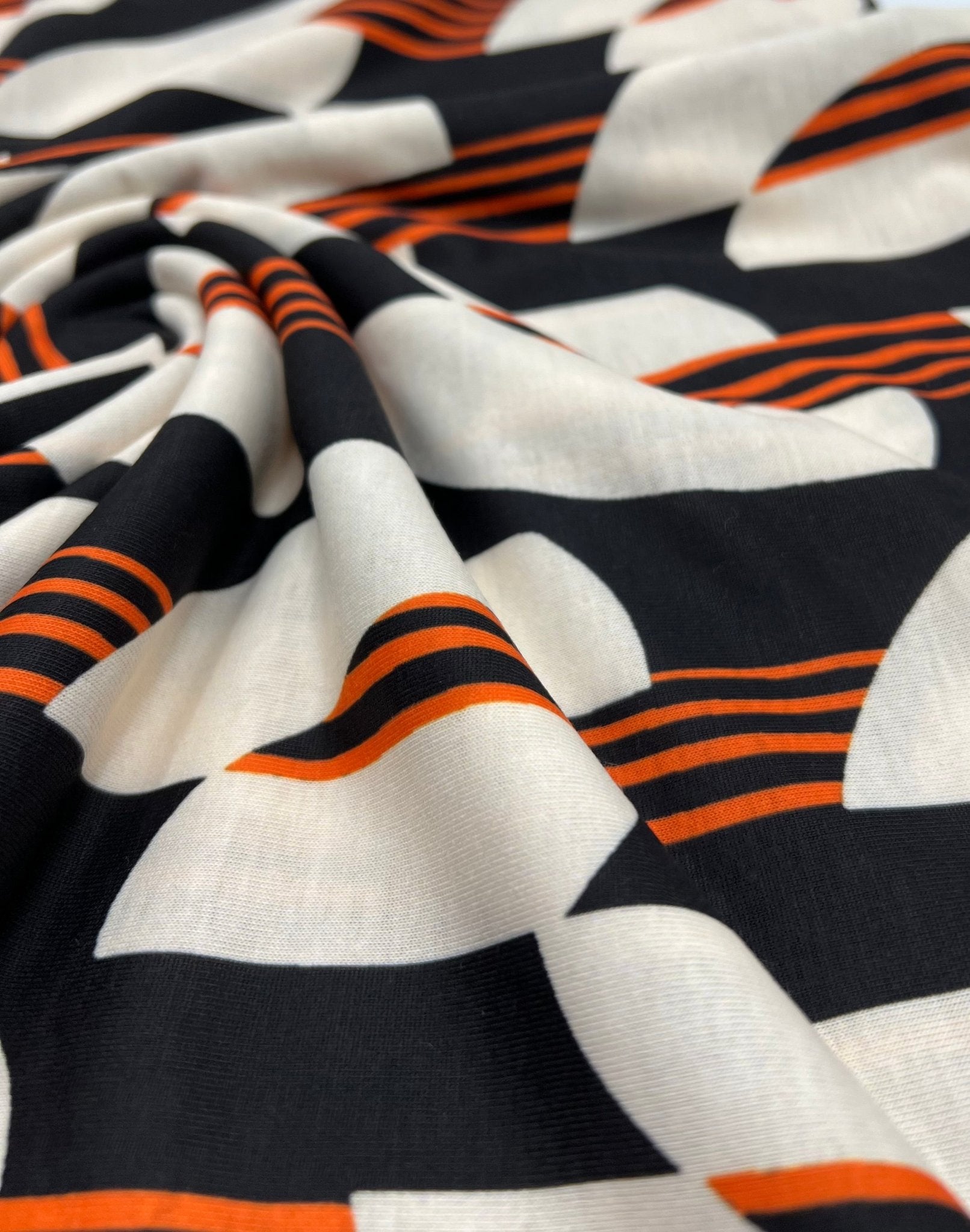 Orange Black Print Spun Poly Stretch Fabric - T9 Fabrics