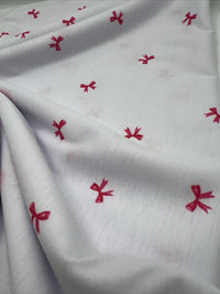 Pink Bow Print Spun Poly Stretch Fabric - T9 Fabrics