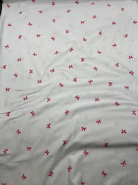 Pink Bow Print Spun Poly Stretch Fabric - T9 Fabrics