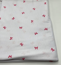 Pink Bow Print Spun Poly Stretch Fabric - T9 Fabrics