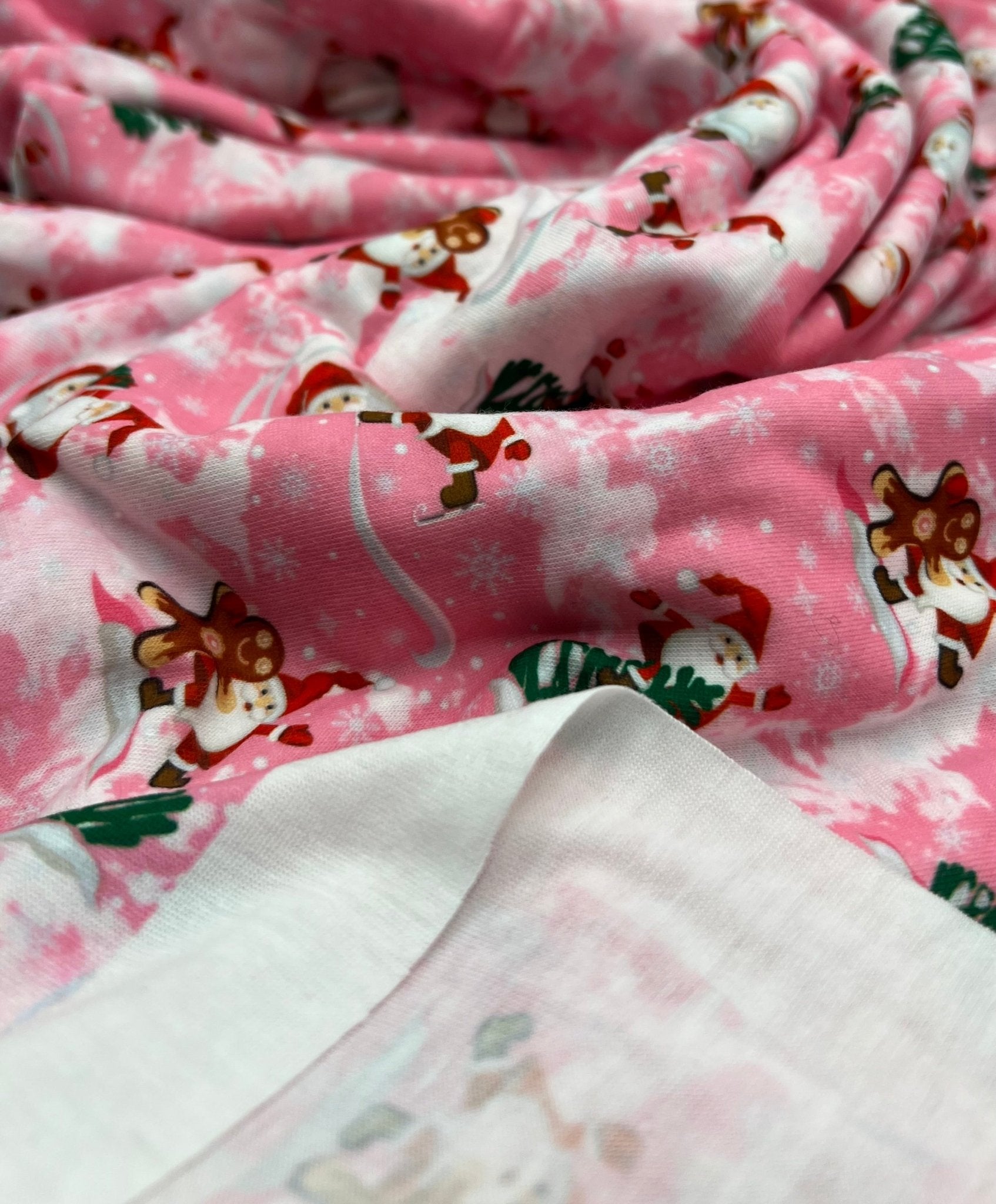 Pink Santa Print Soft Spun Poly Stretch Fabric - T9 Fabrics