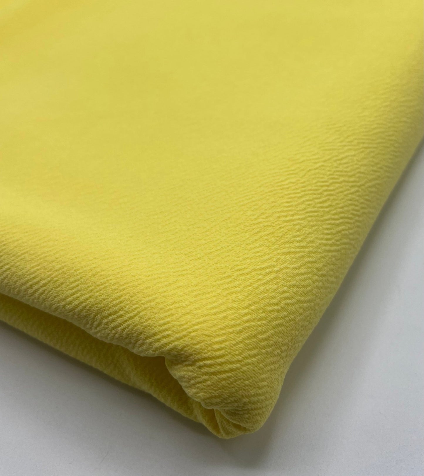 Plain Pastel Yellow Liverpool Bullet Stretch Fabric - T9 Fabrics