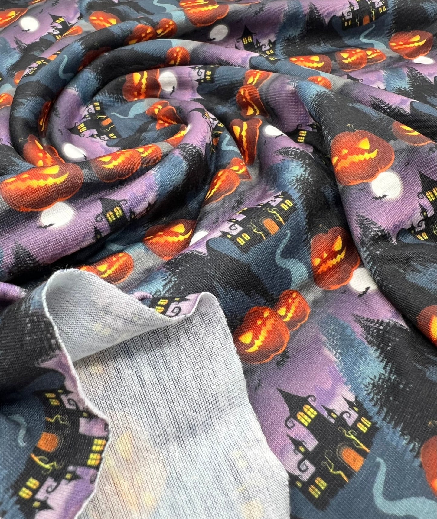 Purple Pumpkin Castle Print Spun Poly Stretch Fabric - T9 Fabrics