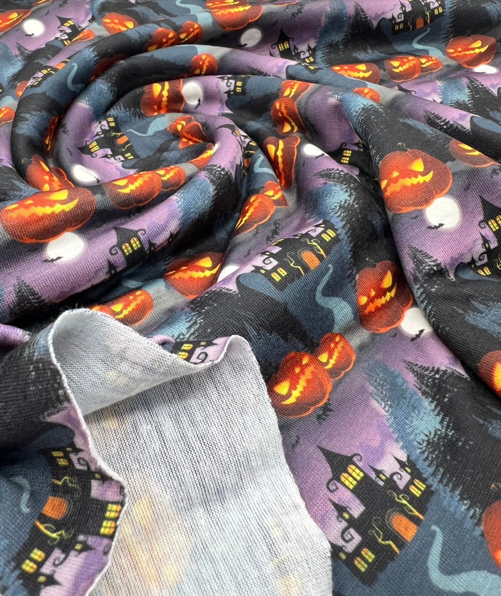 Purple Pumpkin Castle Print Spun Poly Stretch Fabric - T9 Fabrics