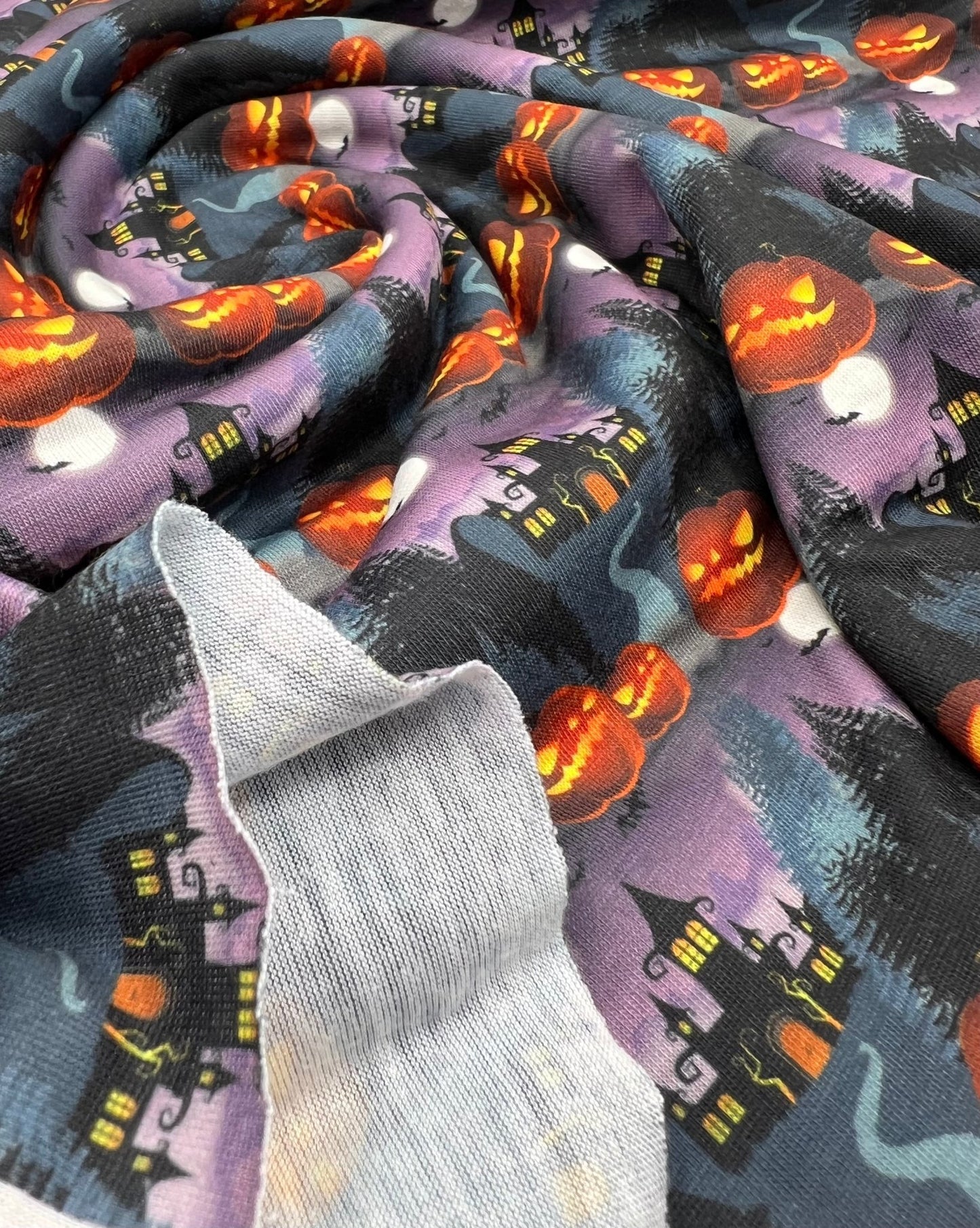 Purple Pumpkin Castle Print Spun Poly Stretch Fabric - T9 Fabrics