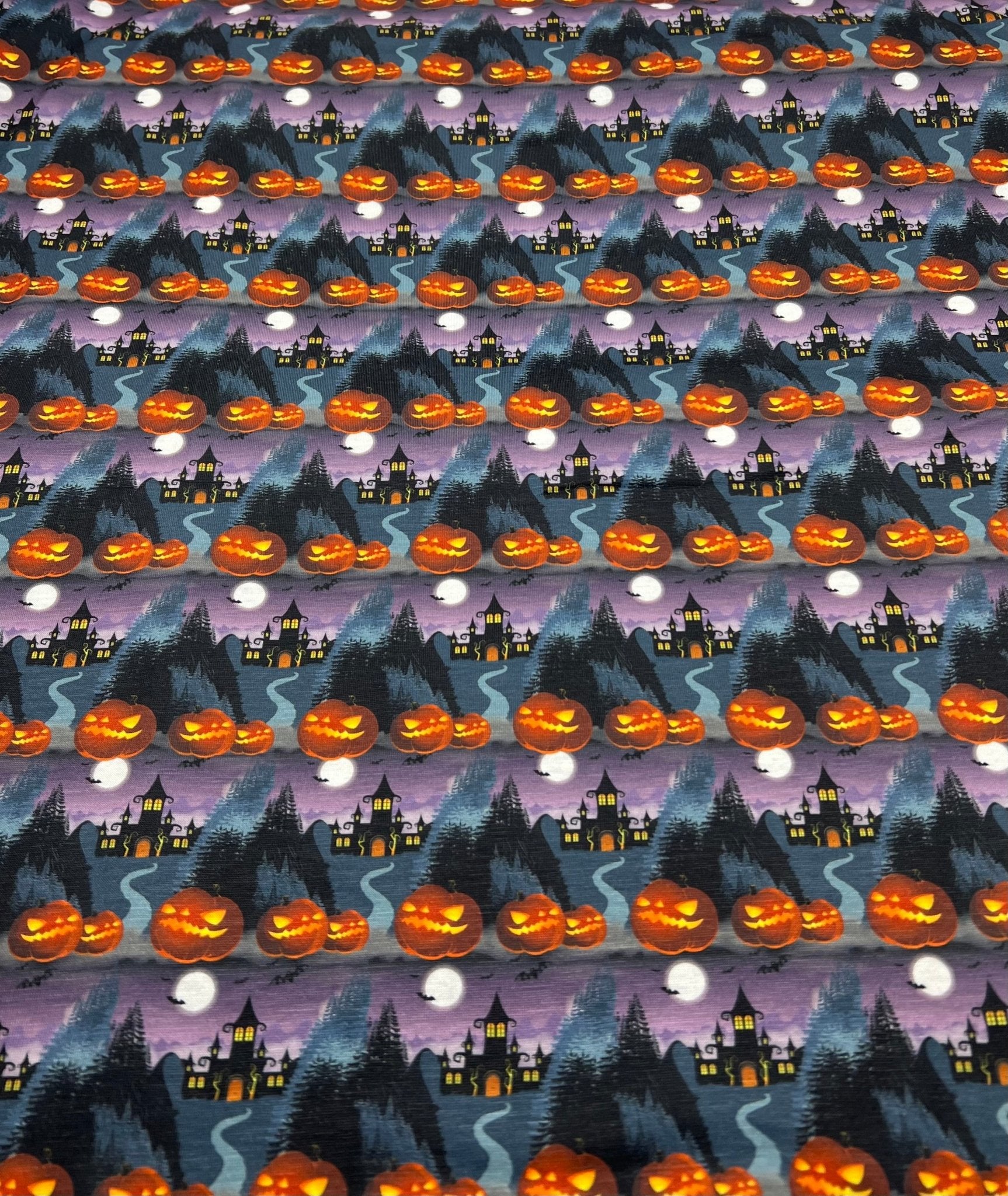 Purple Pumpkin Castle Print Spun Poly Stretch Fabric - T9 Fabrics