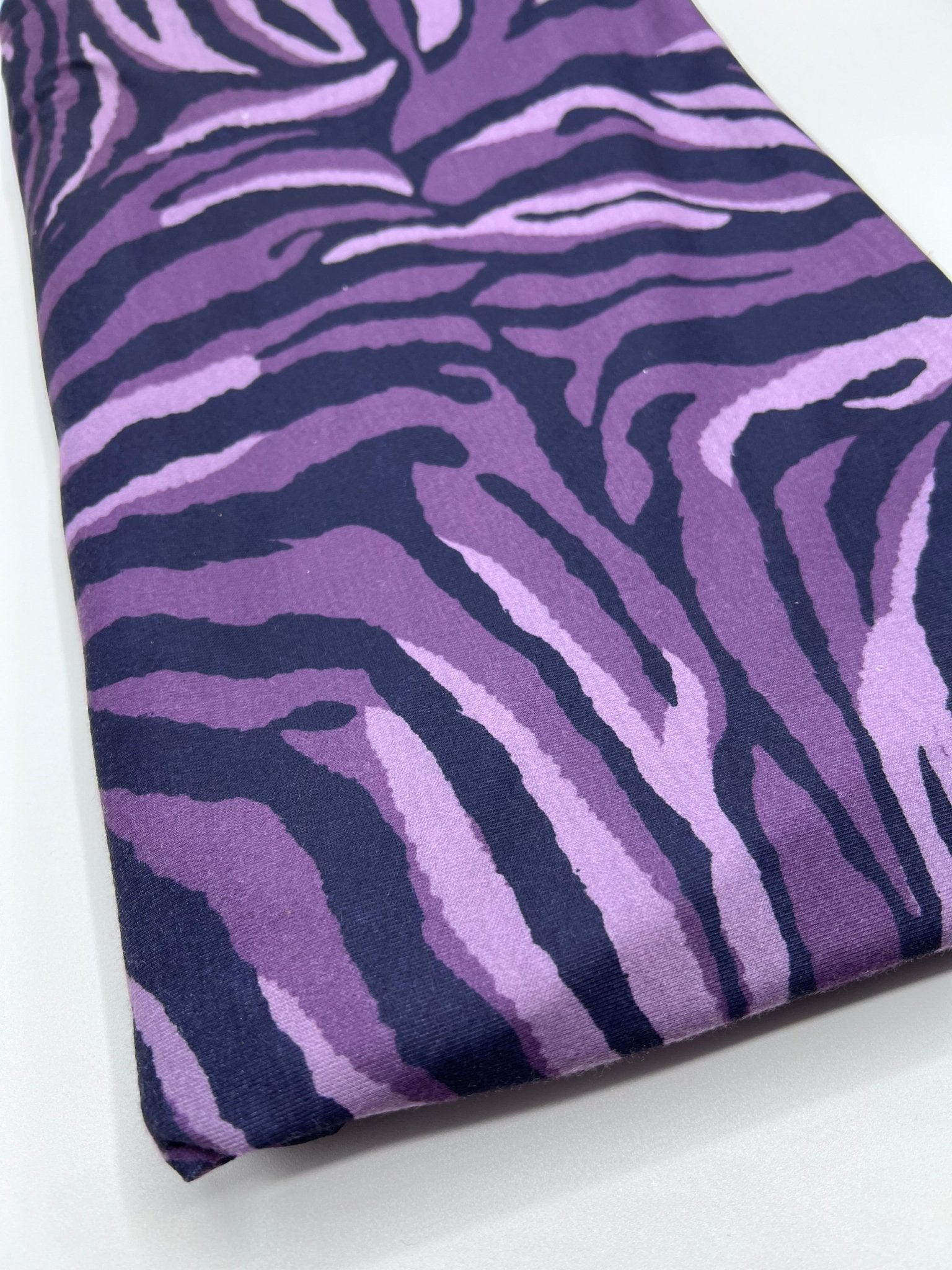 Purple Zebra Spun Poly Stretch Fabric - T9 Fabrics