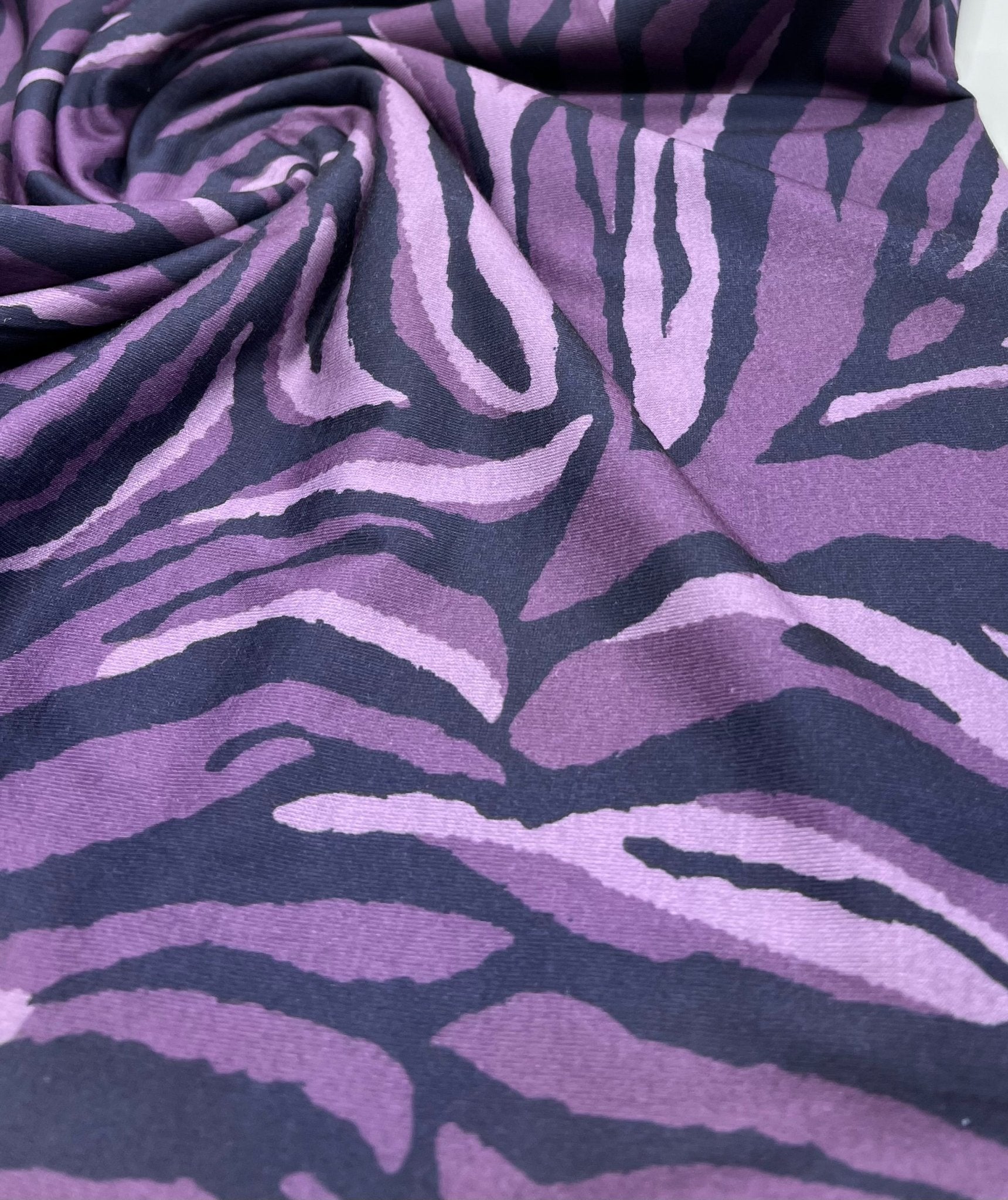 Purple Zebra Spun Poly Stretch Fabric - T9 Fabrics