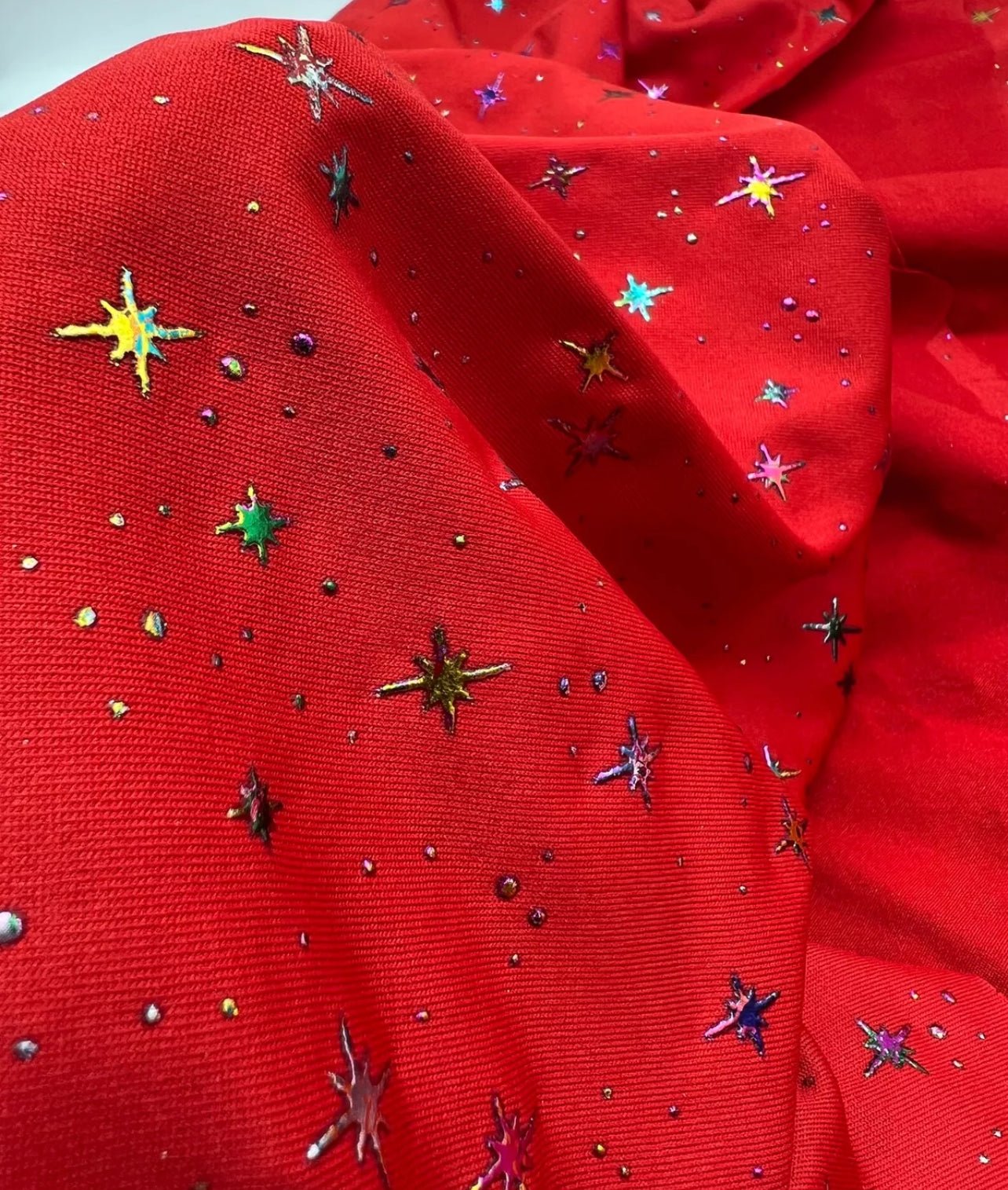 Red Multi Star Soft Spun Poly Stretch Fabric - T9 Fabrics