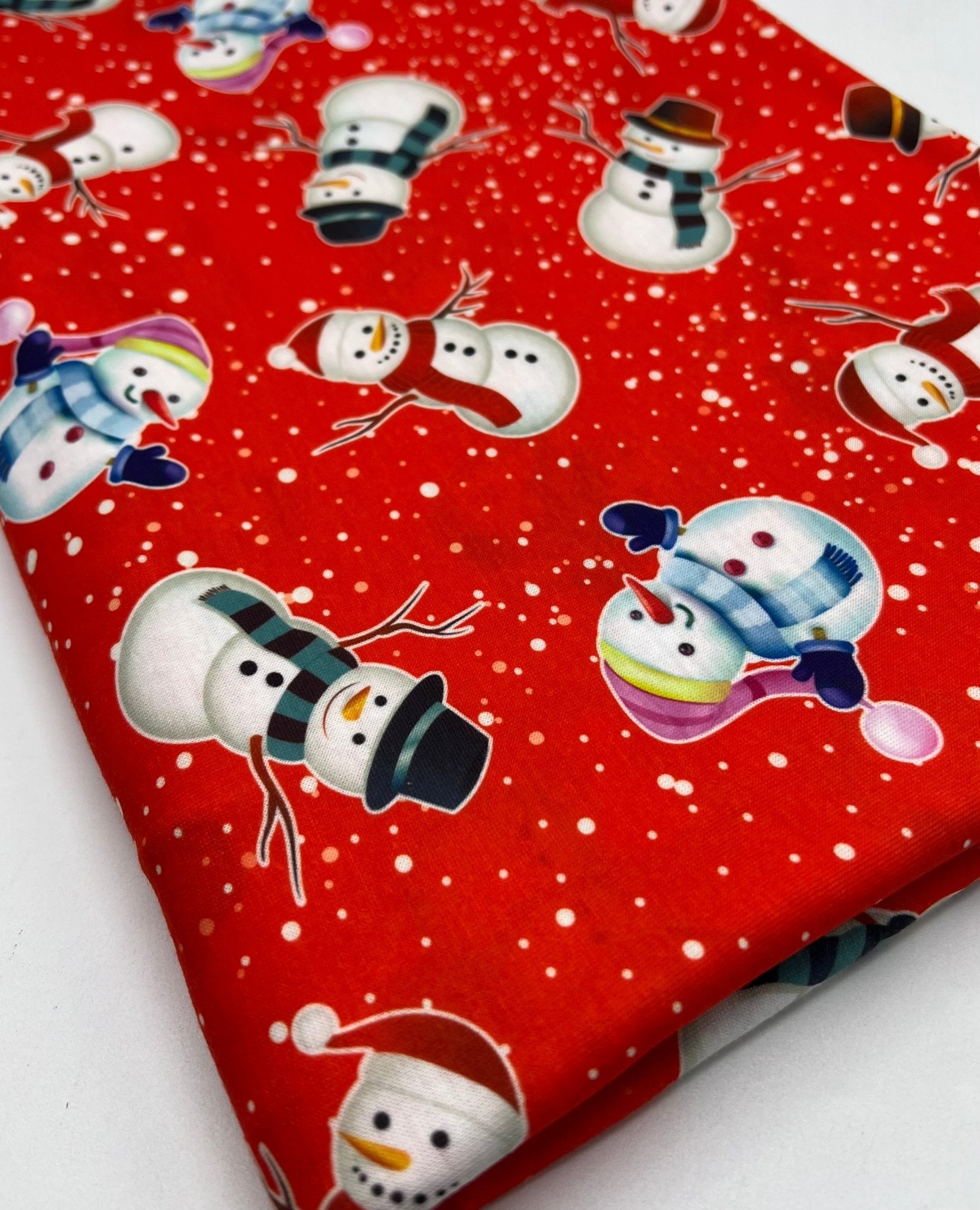 Red Snow Snowman Print Soft Spun Poly Stretch Fabric - T9 Fabrics