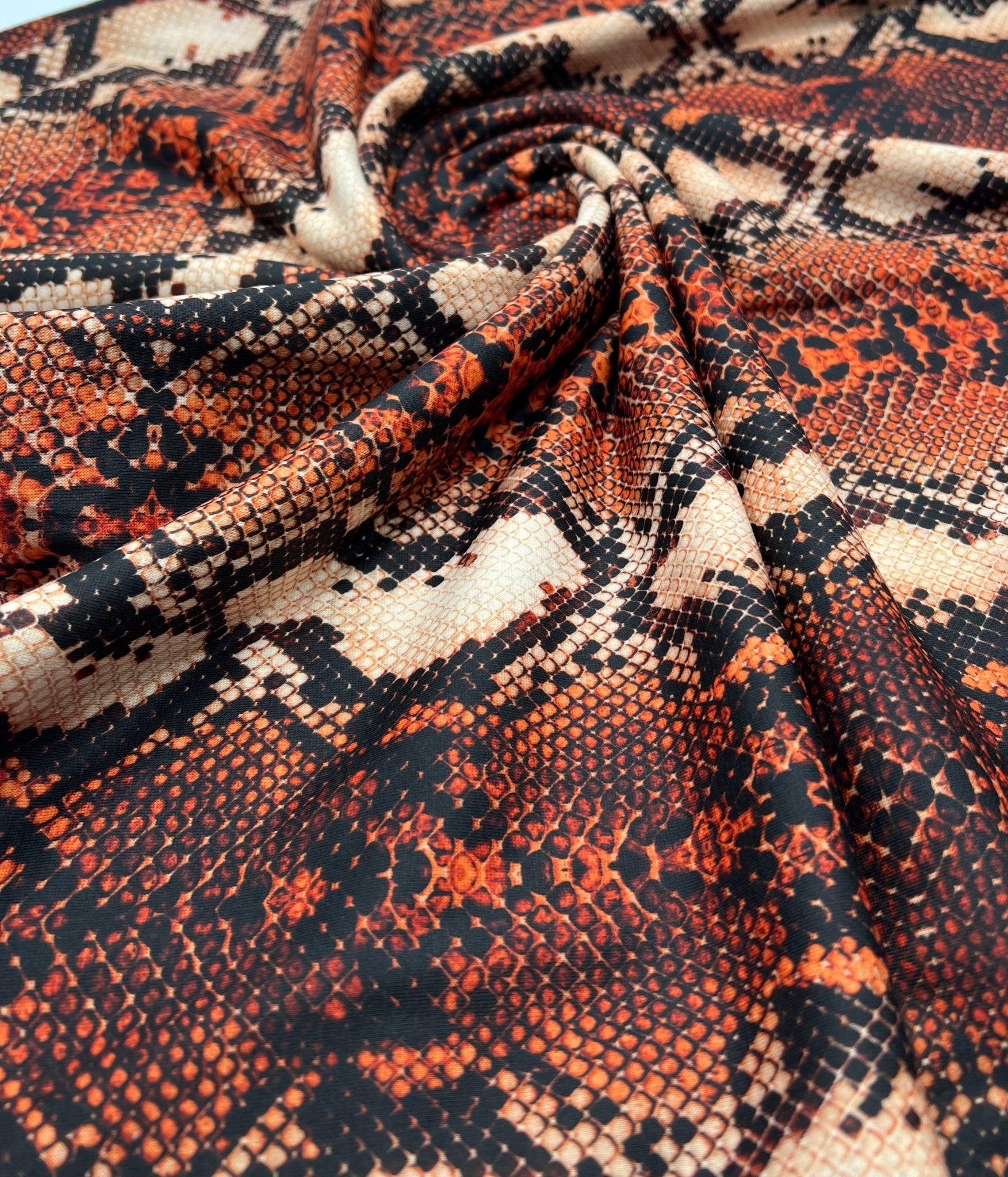 Rust Snake Print Spun Poly Stretch Fabric - T9 Fabrics