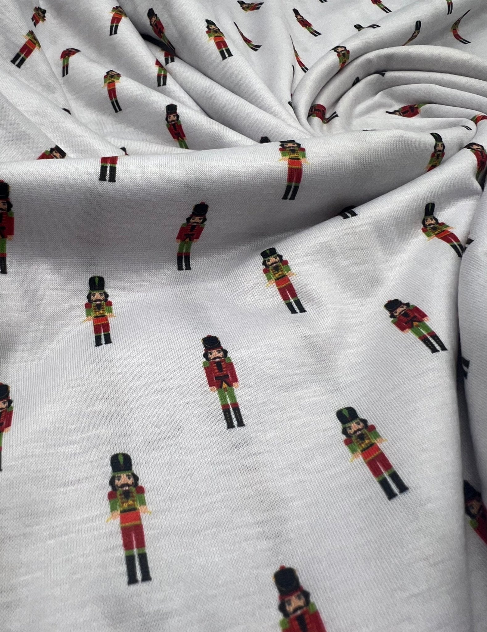 Small Nutcrackers Print Soft Spun Poly Stretch Fabric - T9 Fabrics