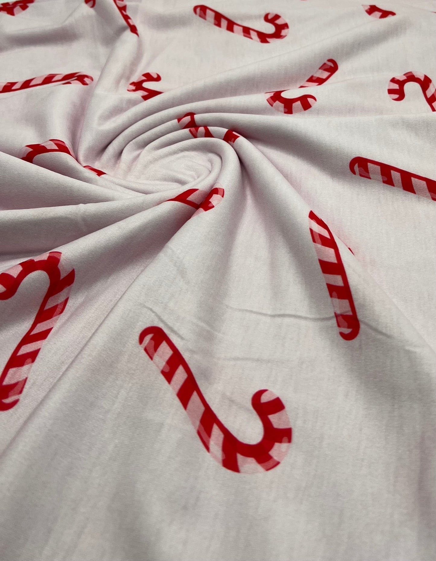 Soft Pink Candy Cane Print Soft Spun Poly Stretch Fabric - T9 Fabrics