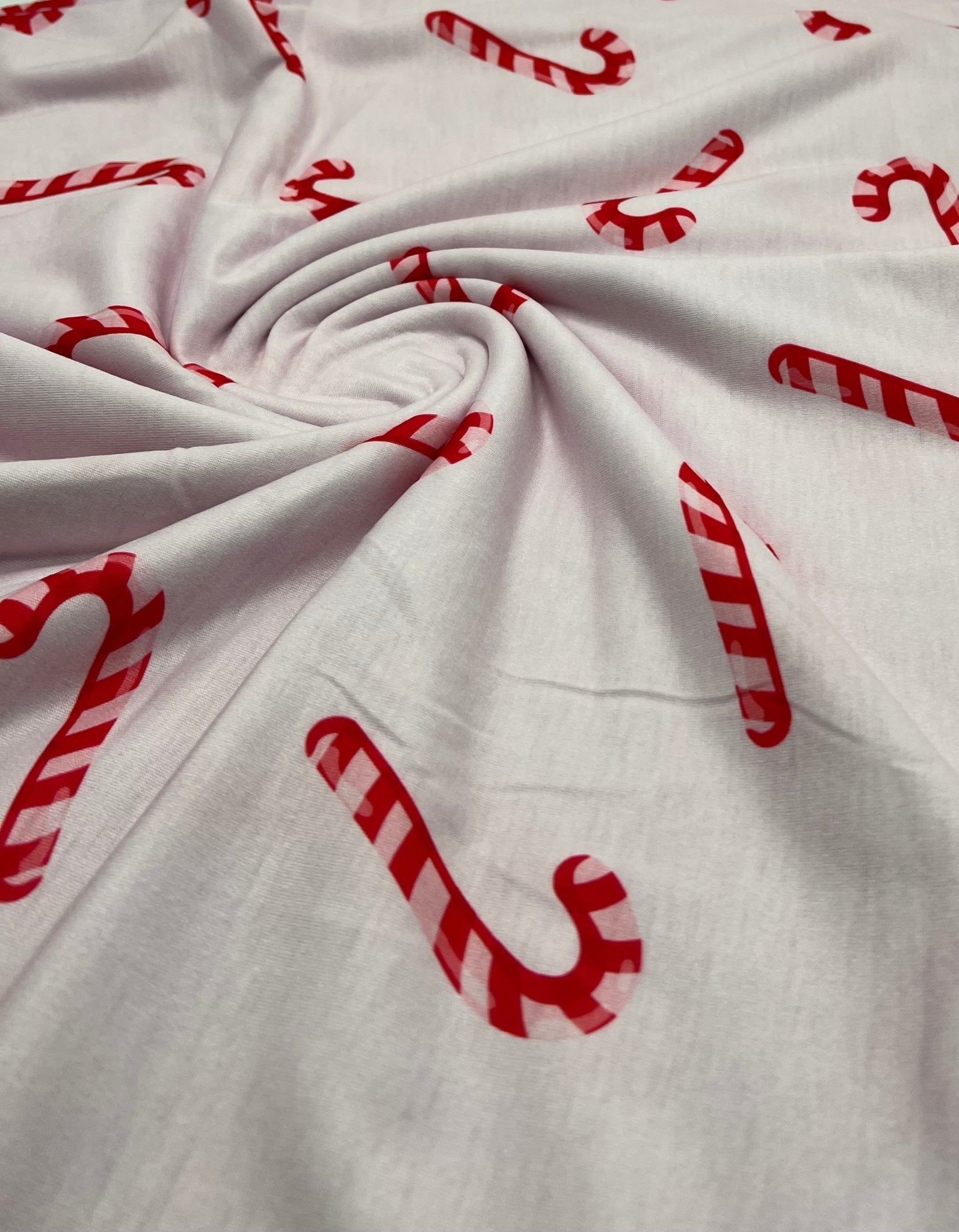 Soft Pink Candy Cane Print Soft Spun Poly Stretch Fabric - T9 Fabrics
