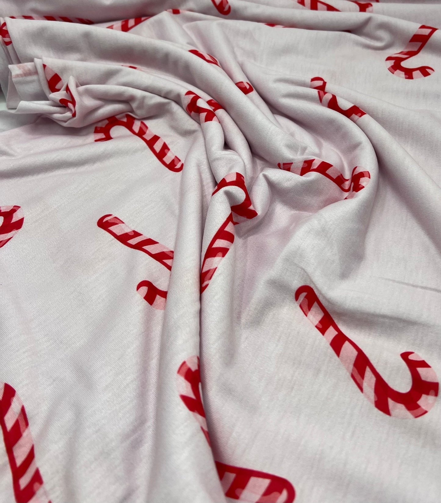 Soft Pink Candy Cane Print Soft Spun Poly Stretch Fabric - T9 Fabrics