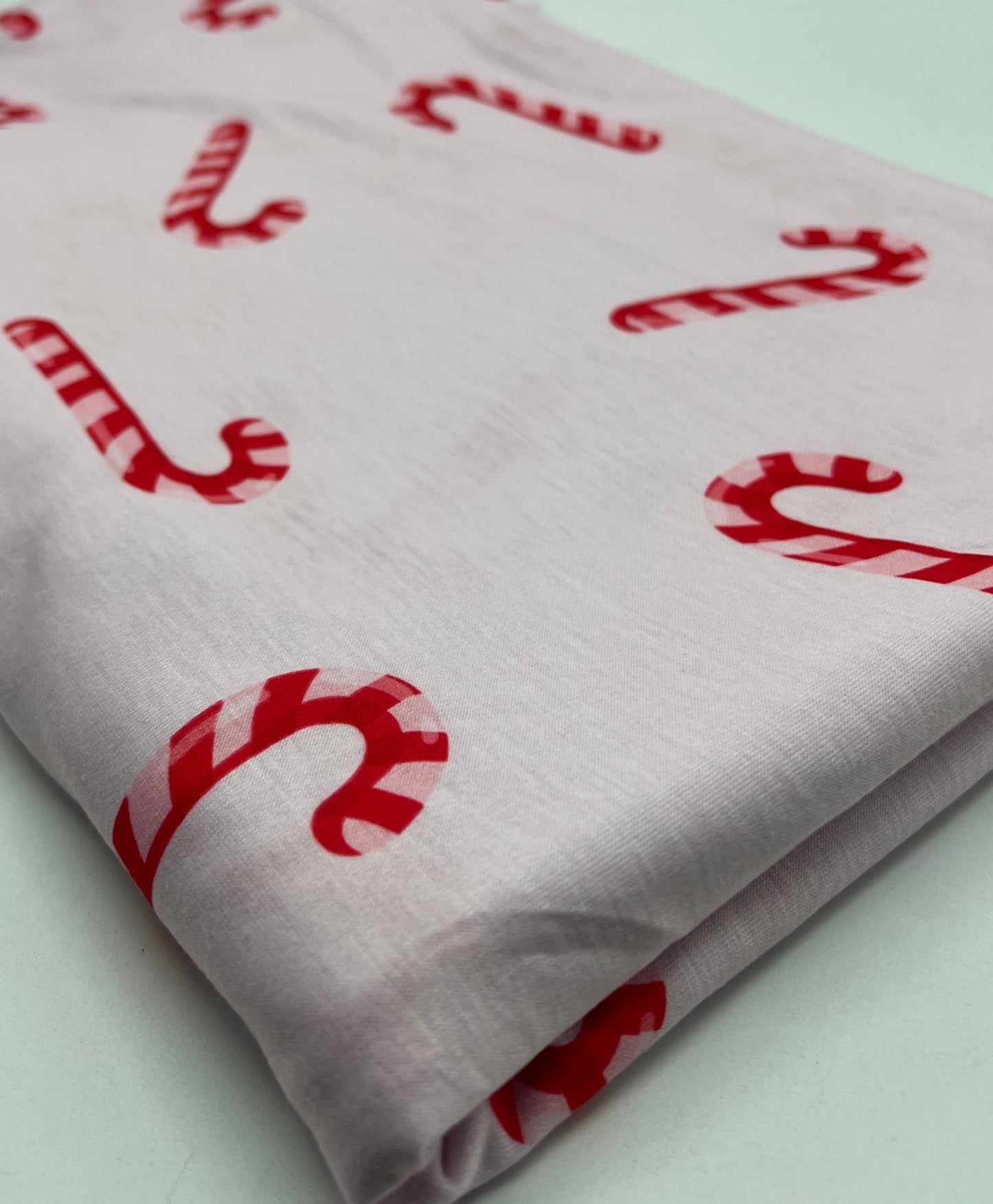 Soft Pink Candy Cane Print Soft Spun Poly Stretch Fabric - T9 Fabrics