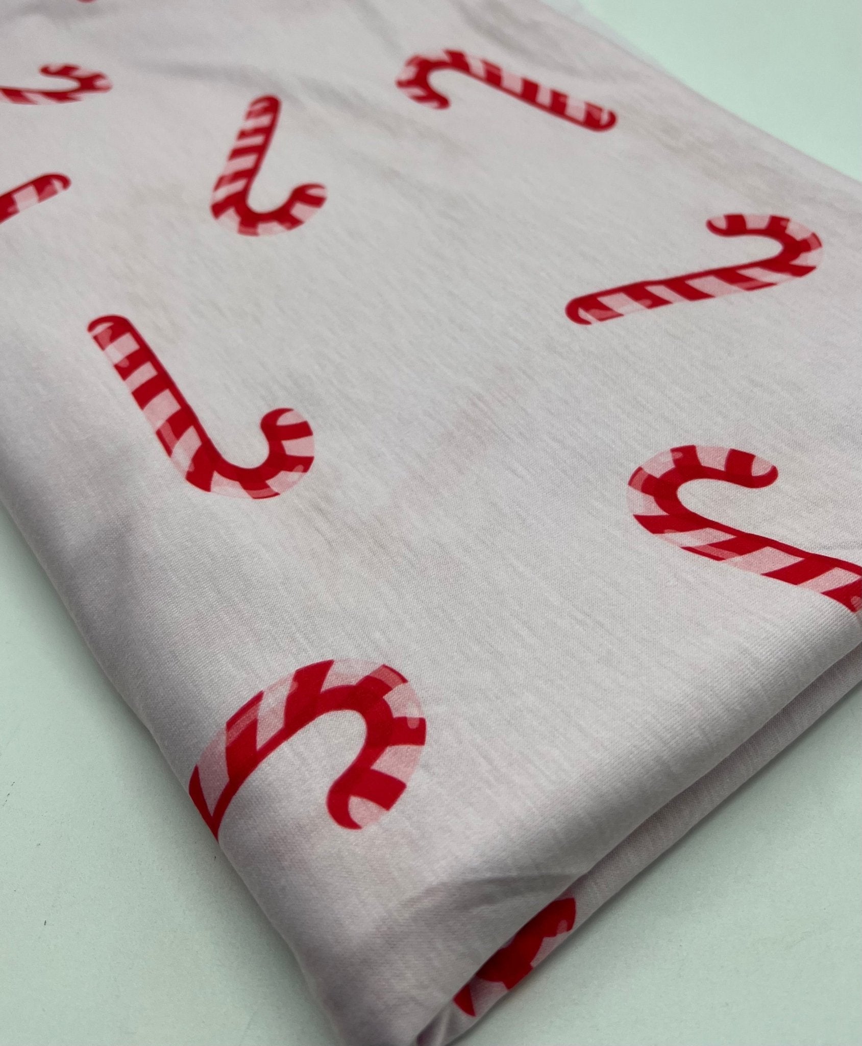 Soft Pink Candy Cane Print Soft Spun Poly Stretch Fabric - T9 Fabrics