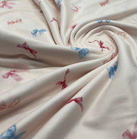 Soft Pink Multi Bows Super Soft Print Spun Poly Stretch Fabric - T9 Fabrics